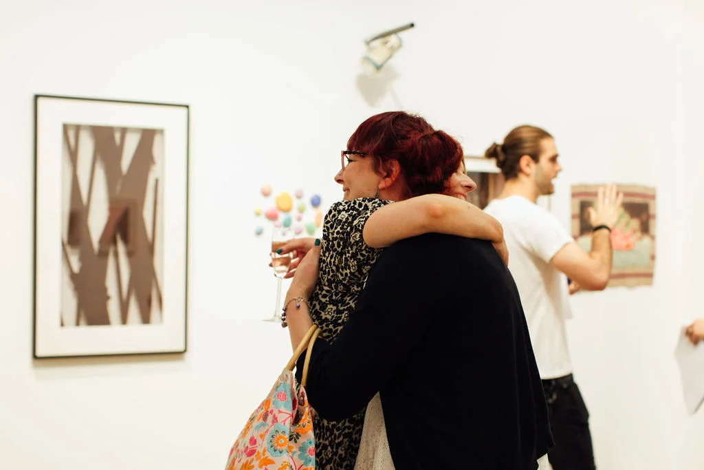 Hospital Rooms’ co-founder Niamh White and Laury Jeanneret share a hug.