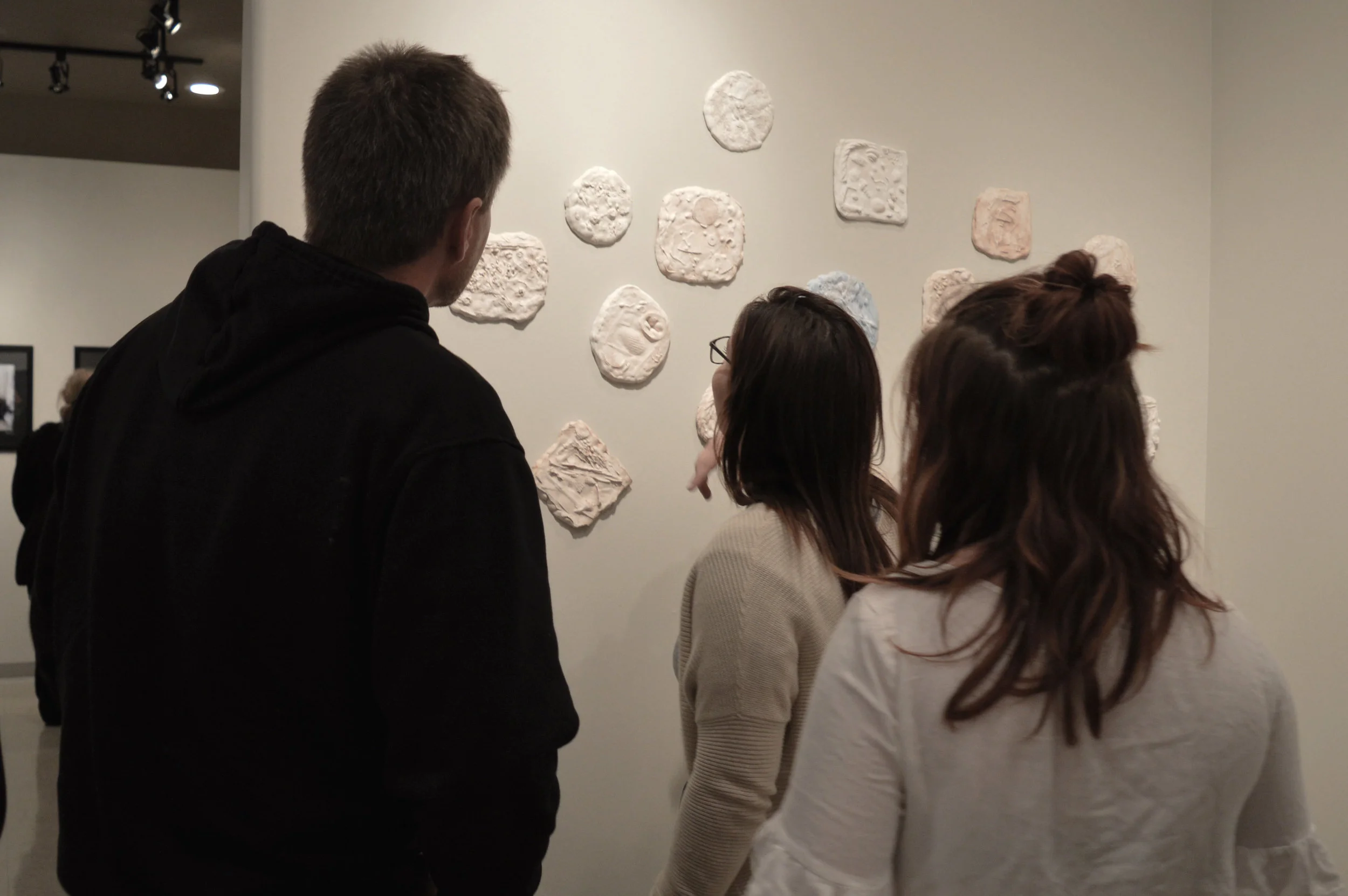 Tidal Resonance Ex people looking at plaster.jpg