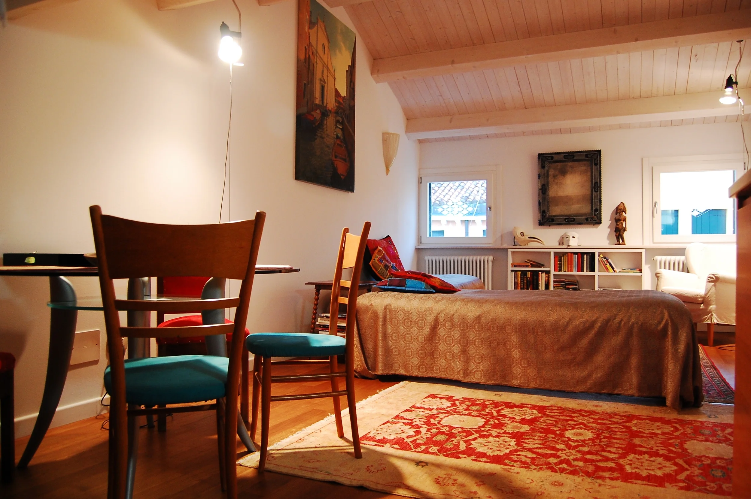  Salotto with crystal dining table. The adorable marble kitchen is to the right. 