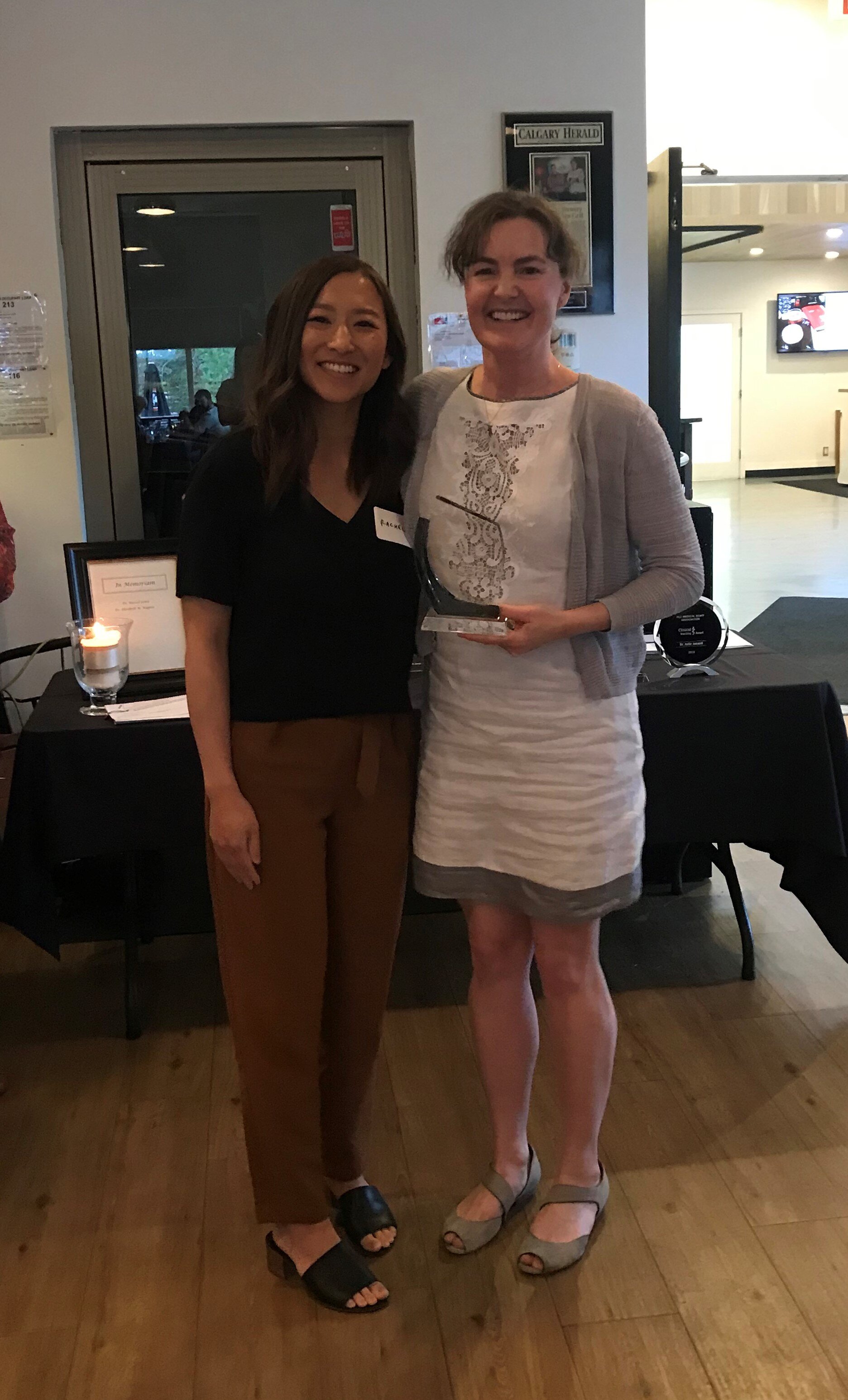 Dr. Rachel Lim accepting award from Dr. Andrea Loewen.jpg