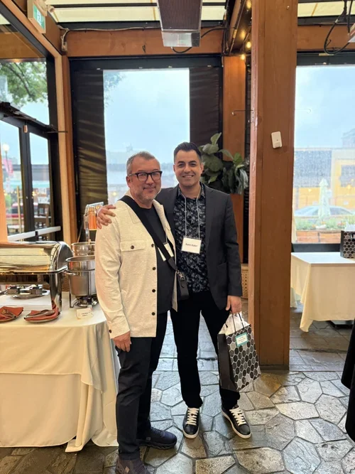 Dr. Ray Zhou (left - award presenter) & Dr. Udell Larsen