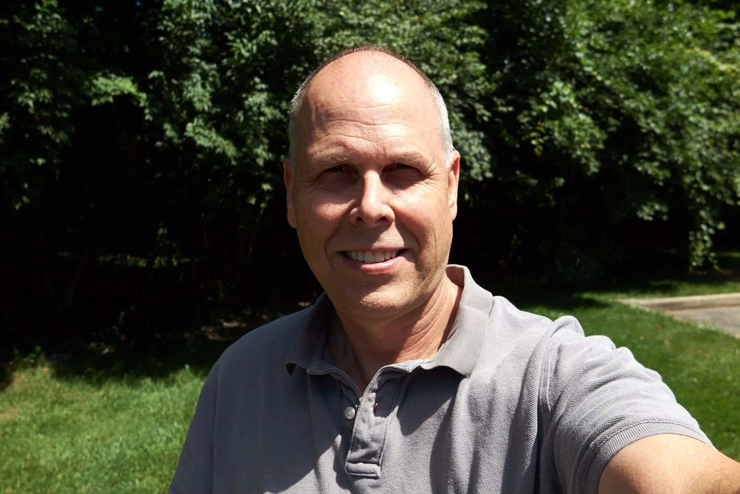 WORST TIME OF DAY! Photo Taken just before Noon with direct overhead sun causes Racoon Eyes shown here with this selfie picture of me.