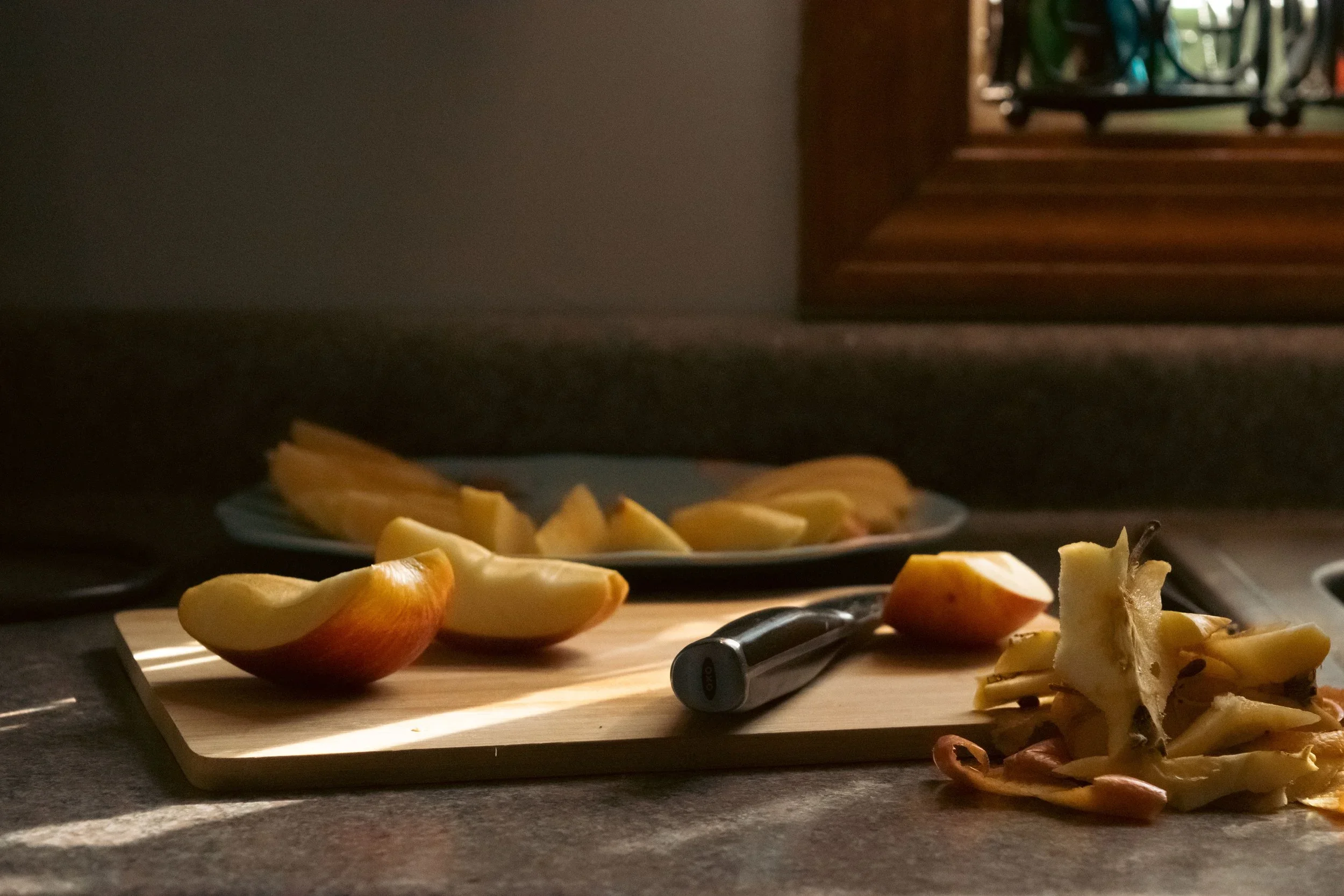 Leilani, Photography in the Digital Age (MassArt), Digital Photo, Archival Inkjet Print, 2021 Leilani photographed her grandmother cutting fruit. For her these images captured a nostalgic feeling of home, social tradition and ephemeral nature of a