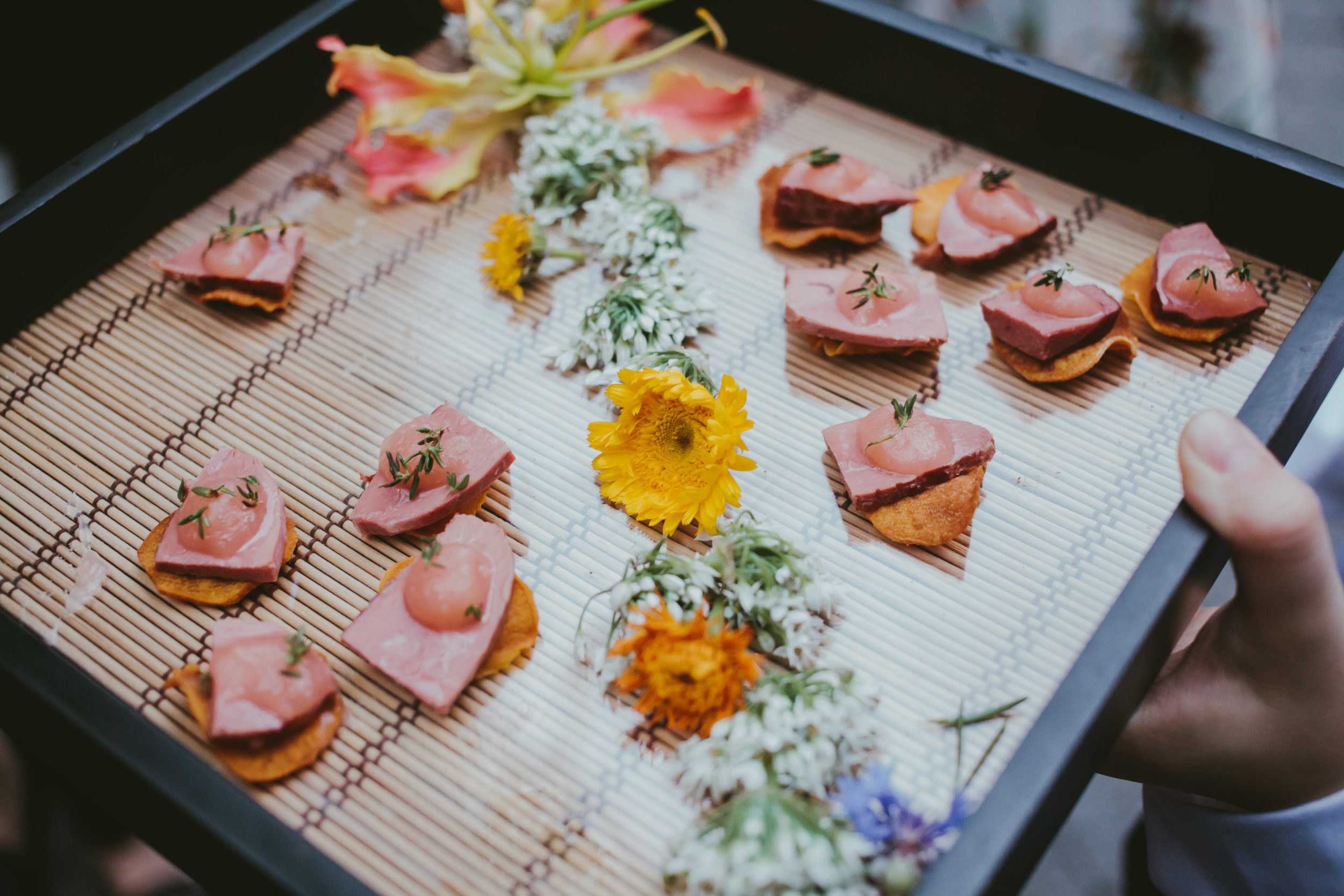 Smoked duck on sweet potato chip with ginger rhubarb compote.JPG