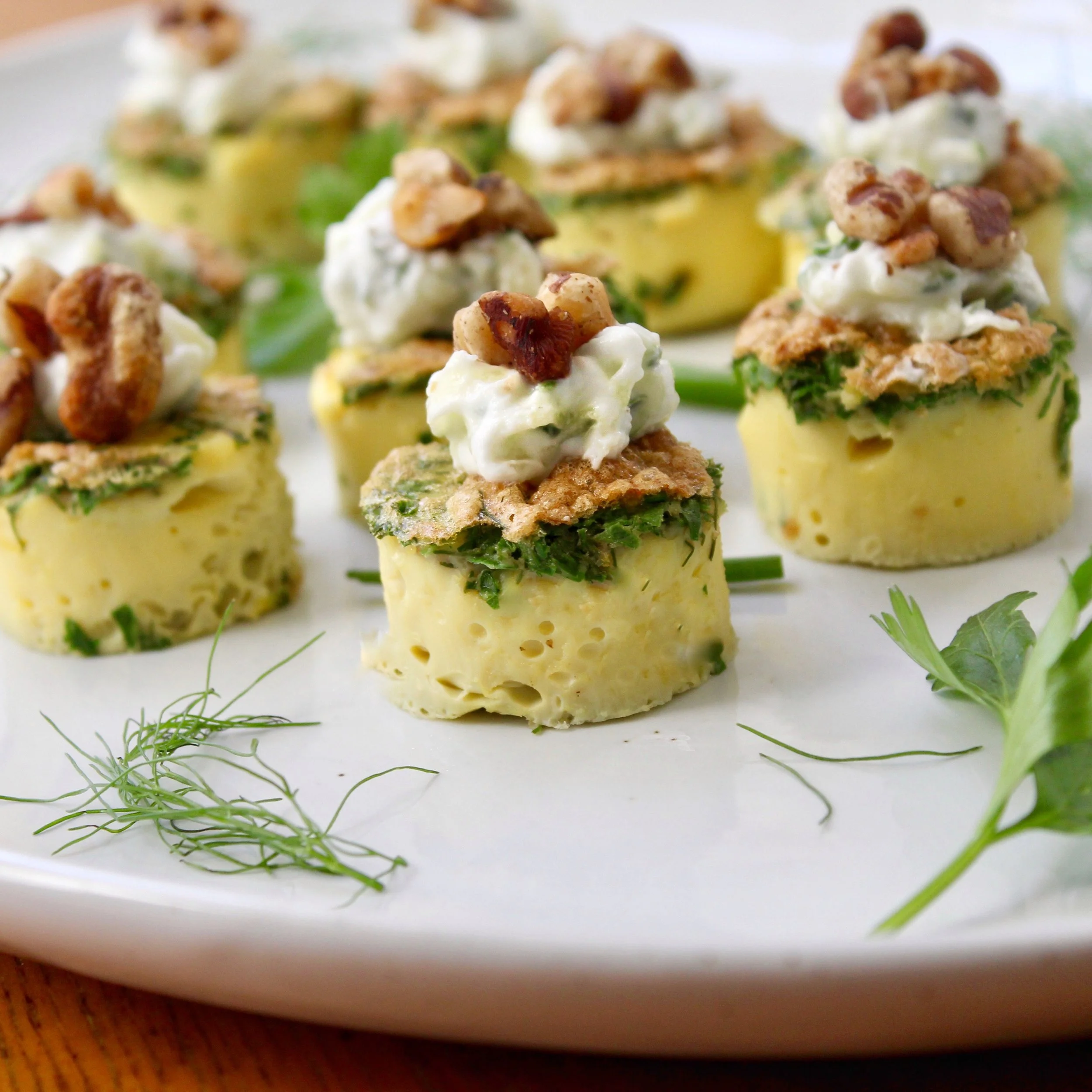 Mini frittatas w herb crust cucumber yogurt black walnuts.jpeg