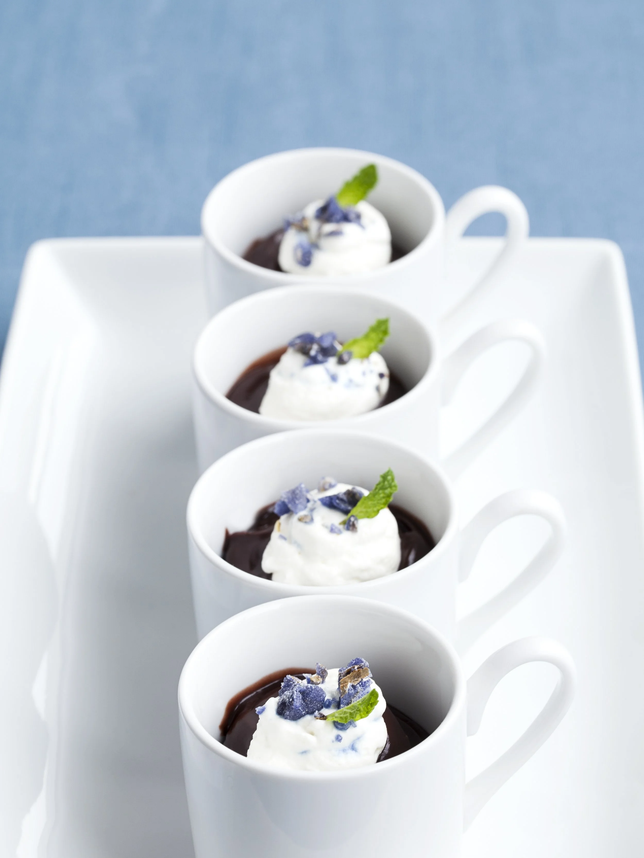 Chocolate pudding with creme fraiche and candied violets.jpg