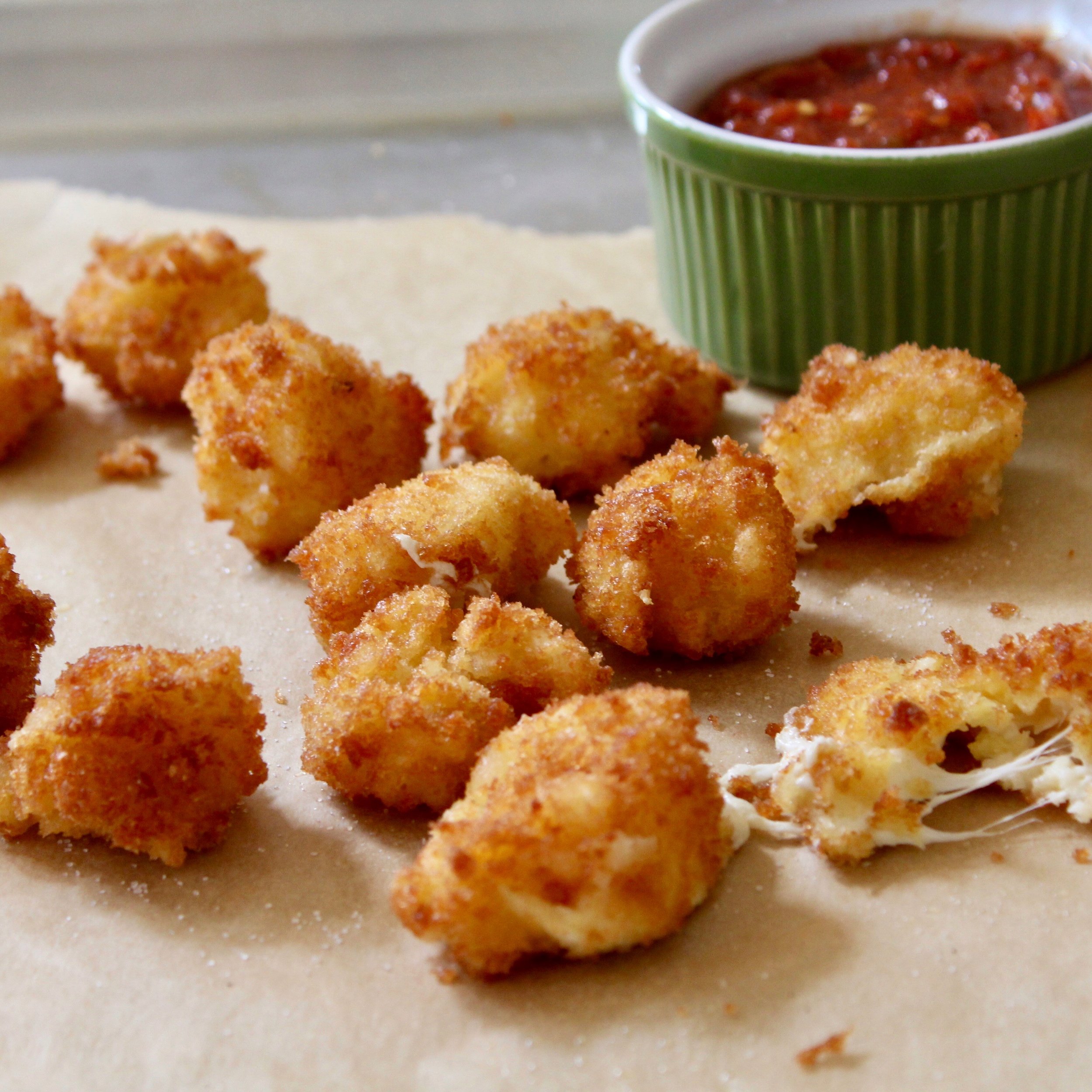 Fried burrata with spicy marinara sauce.jpeg