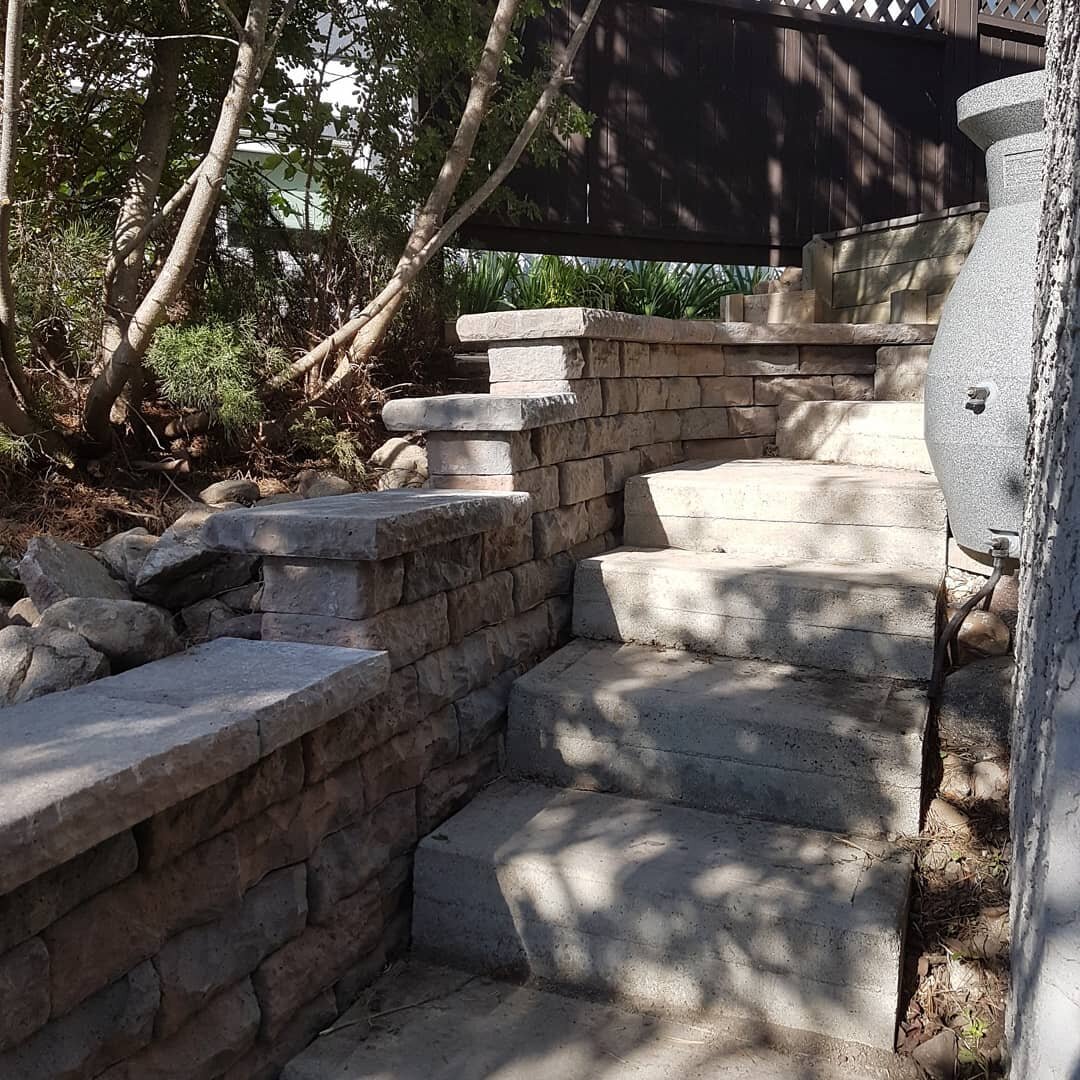 Recently finlshed an upgrade to a job my father-in-law did around 30 years ago.  Cool yard, but with no easy access to move the 31,000 lbs of stones into place. Steps at either end!  The Barkman Rosetta Dimensional Wall is big step up from the origin