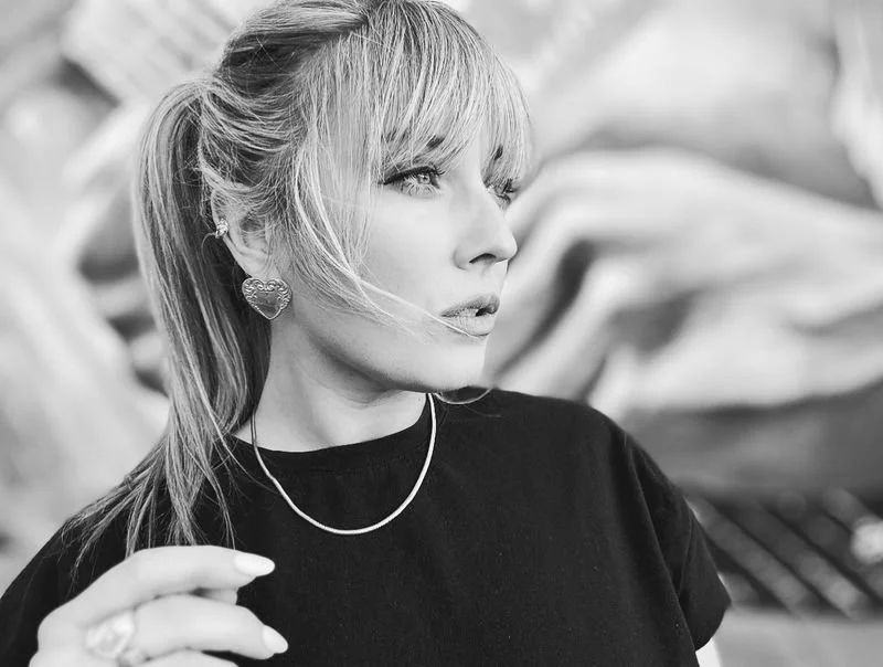 Black-and-white portrait of Chloë Agnew