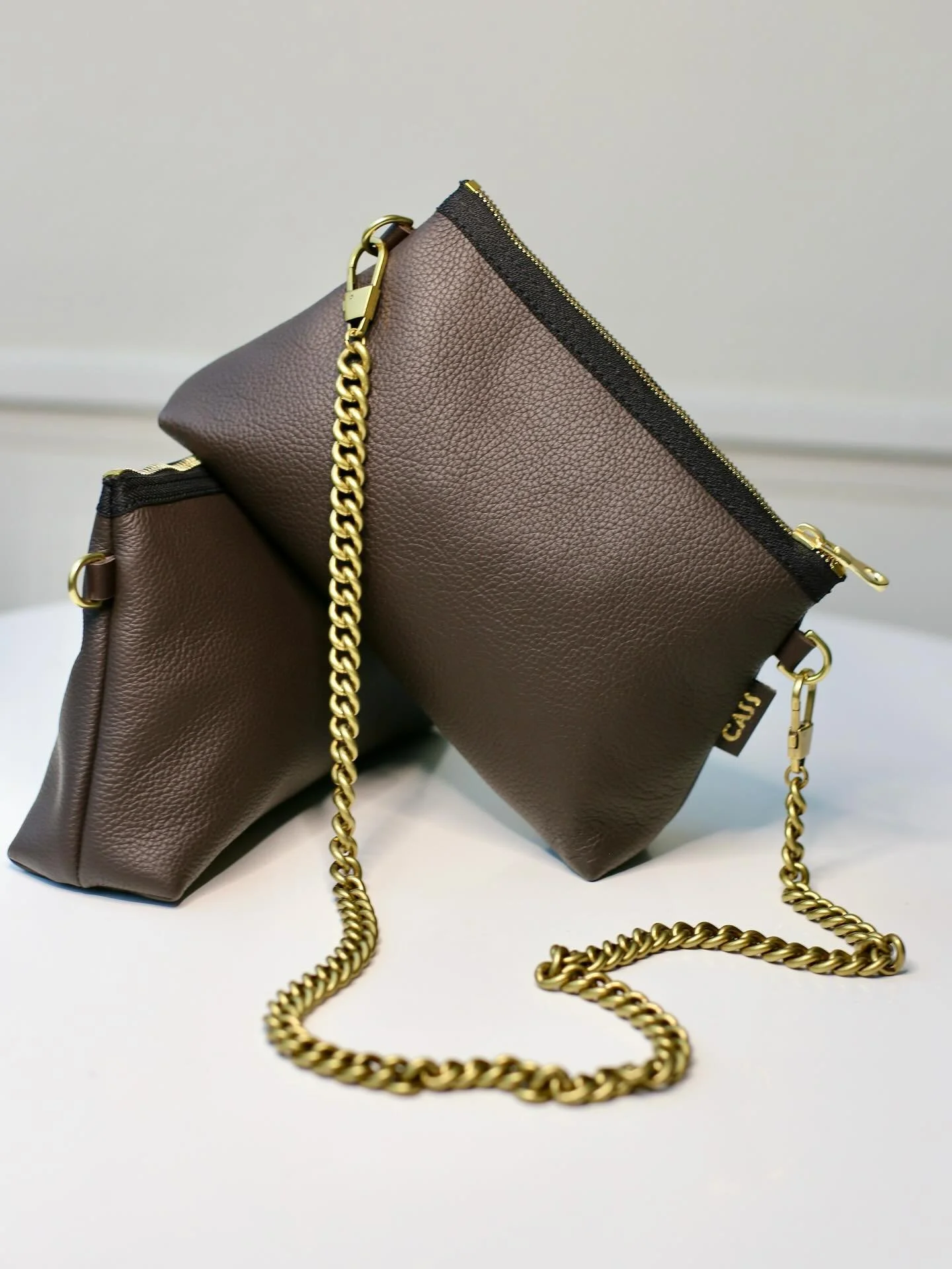 Introducing Catalina Mahogany now available in our Tapered Pouch.  Carry as clutch, store essentials inside a larger Cass or attached a strap and wear crossbody.