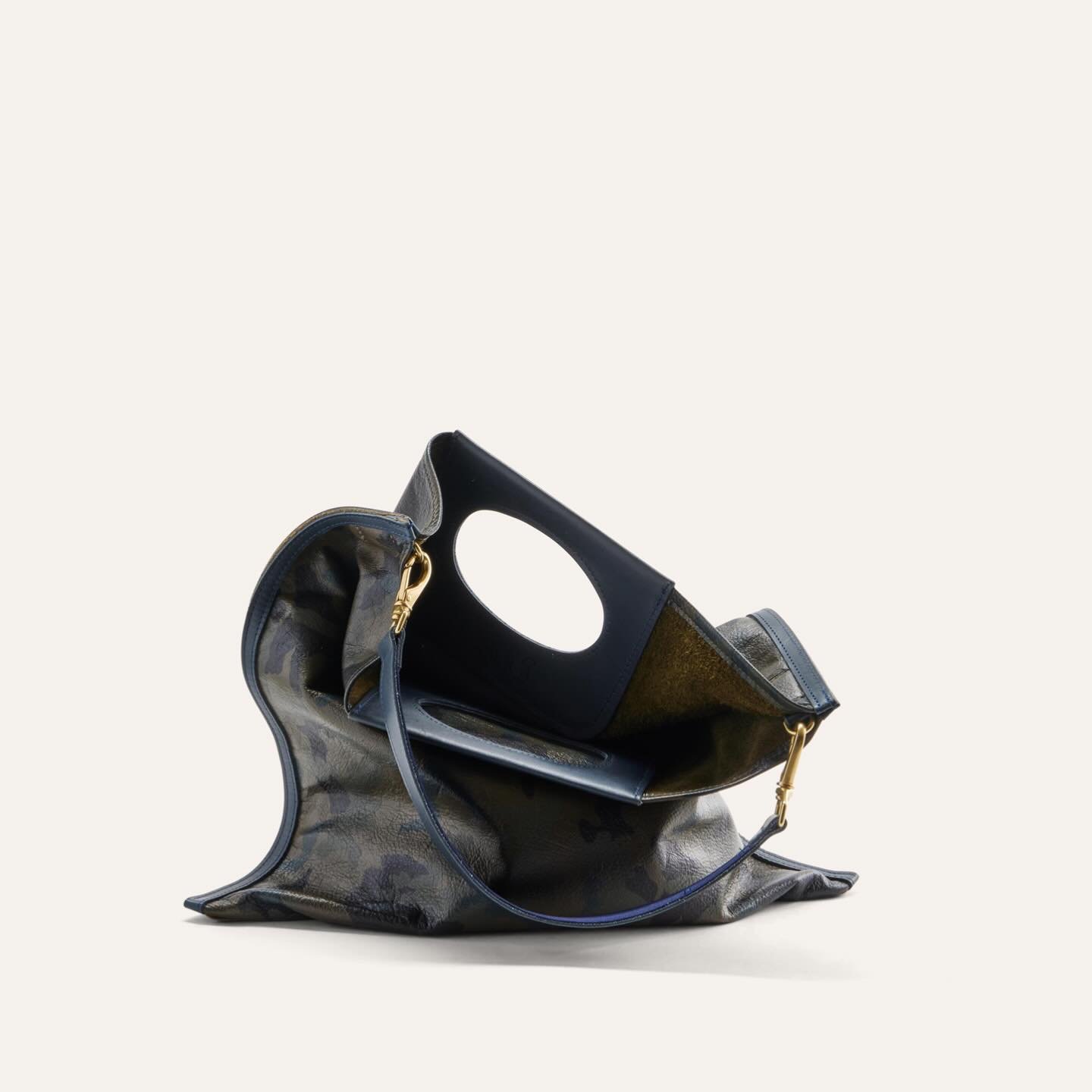 Structured and sensuous.  Carry a Cass on your shoulder, clutched or by the iconic handle.