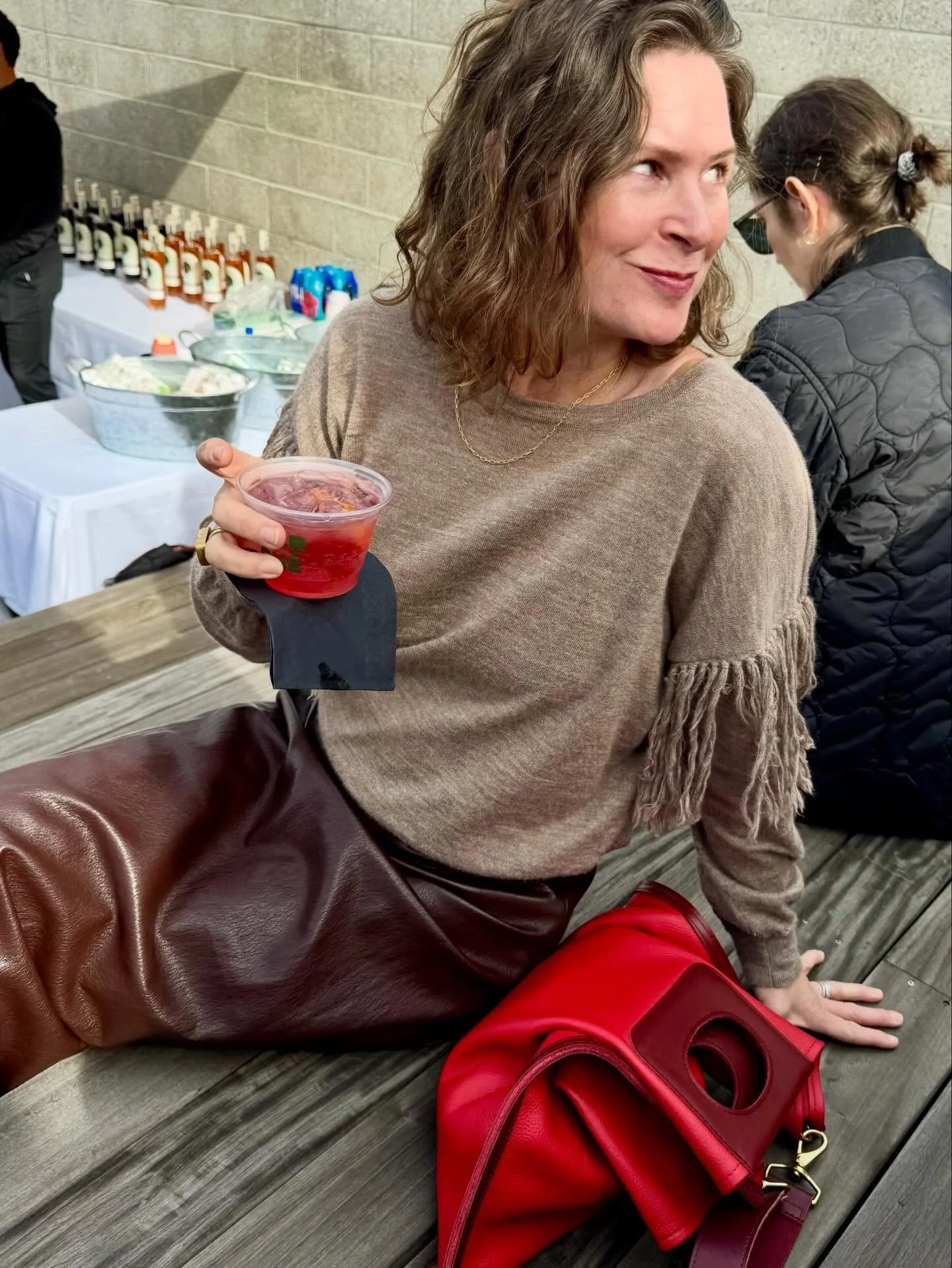 What We Carry | @amandalwalter carrying a Classic Cass in LA Rouge shopping beautiful textiles from @centuries.rugshoppe @marche.collective .  Love her style and how the color pops among neutral hues!  #marchecollective