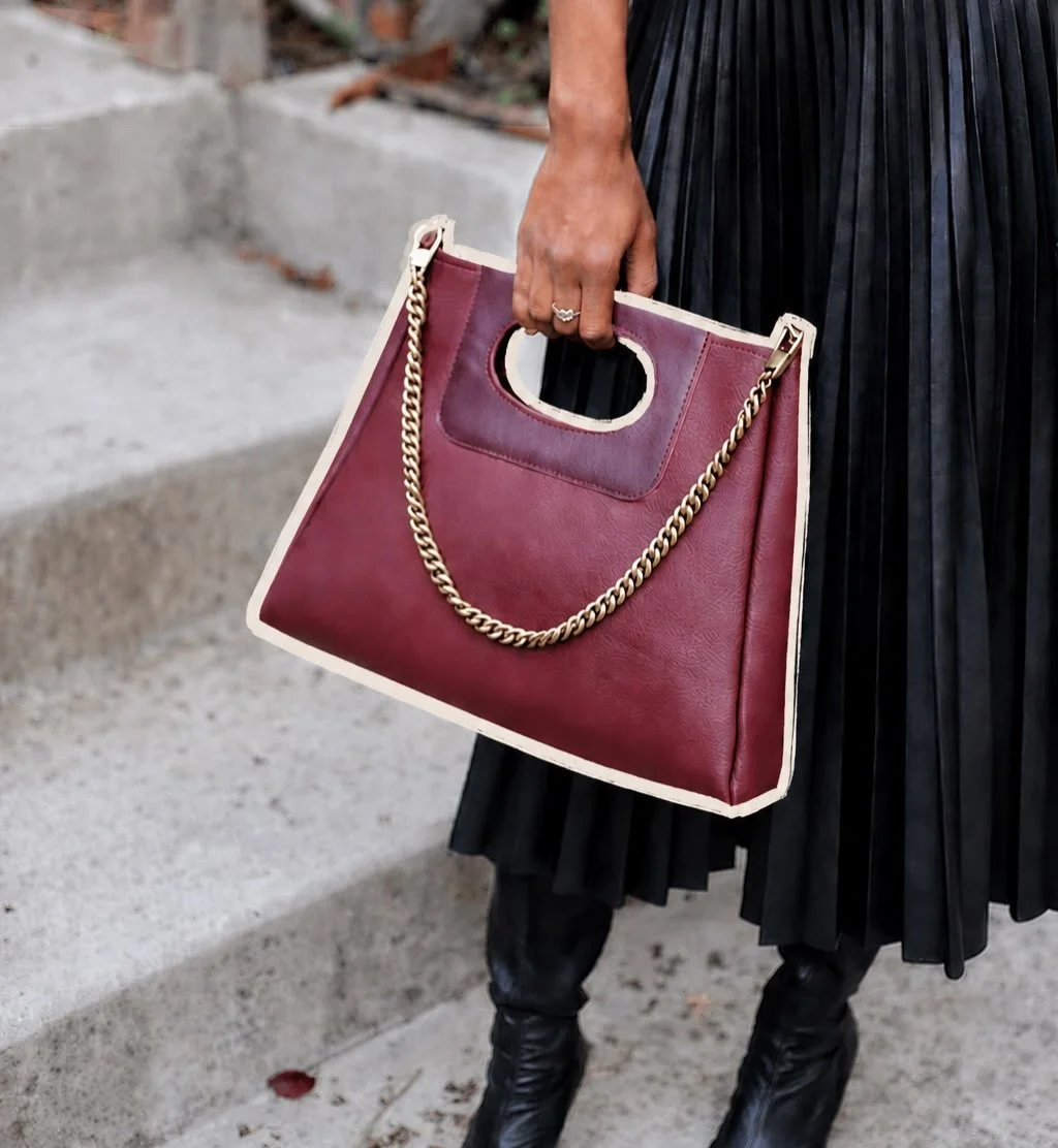 The Cassie &mdash; the second silhouette in the Cass Collection.

Carry it crossbody, on the shoulder, in the crook of your arm, or by its iconic handle. Shown here in Sonoma Wine &mdash; Cass&rsquo;s signature burgundy hue, an unexpected statement c