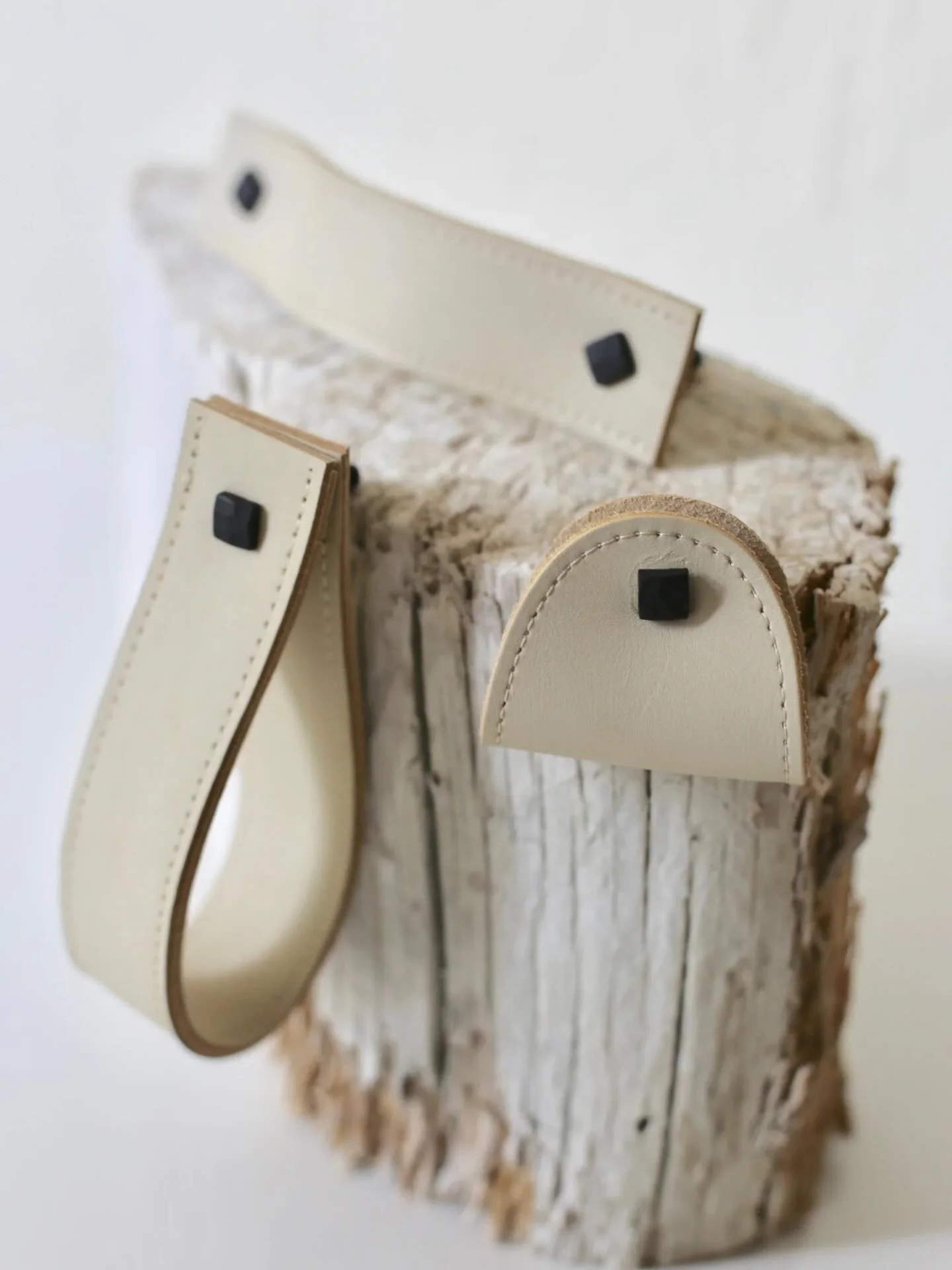 Leather pulls fashioned from Imperial Dune leather, bridging interior and handbag design. Each pull brings warmth, texture, and character to cabinetry and furniture.  Also available in Lassen Black and Stinson Amber. Custom sizes and quantities avail