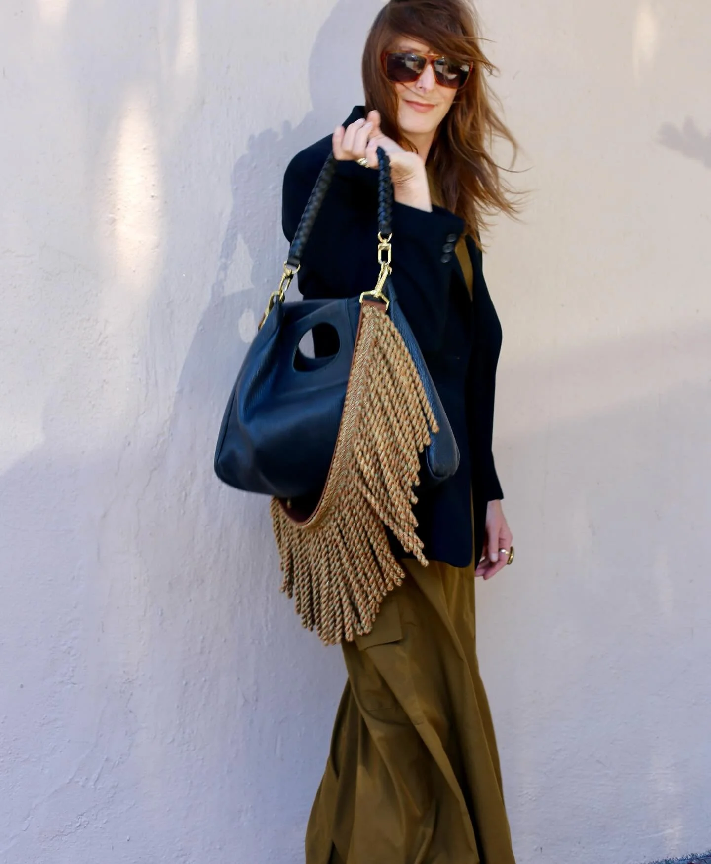Limited Run: The Tassel Strap

Inspired by my work as an interior designer, the Limited Run Tassel Strap is a perfect example of how creativity flows from one passion to another. Crafted from decorative trim in warm Stinson Amber tones, this piece br