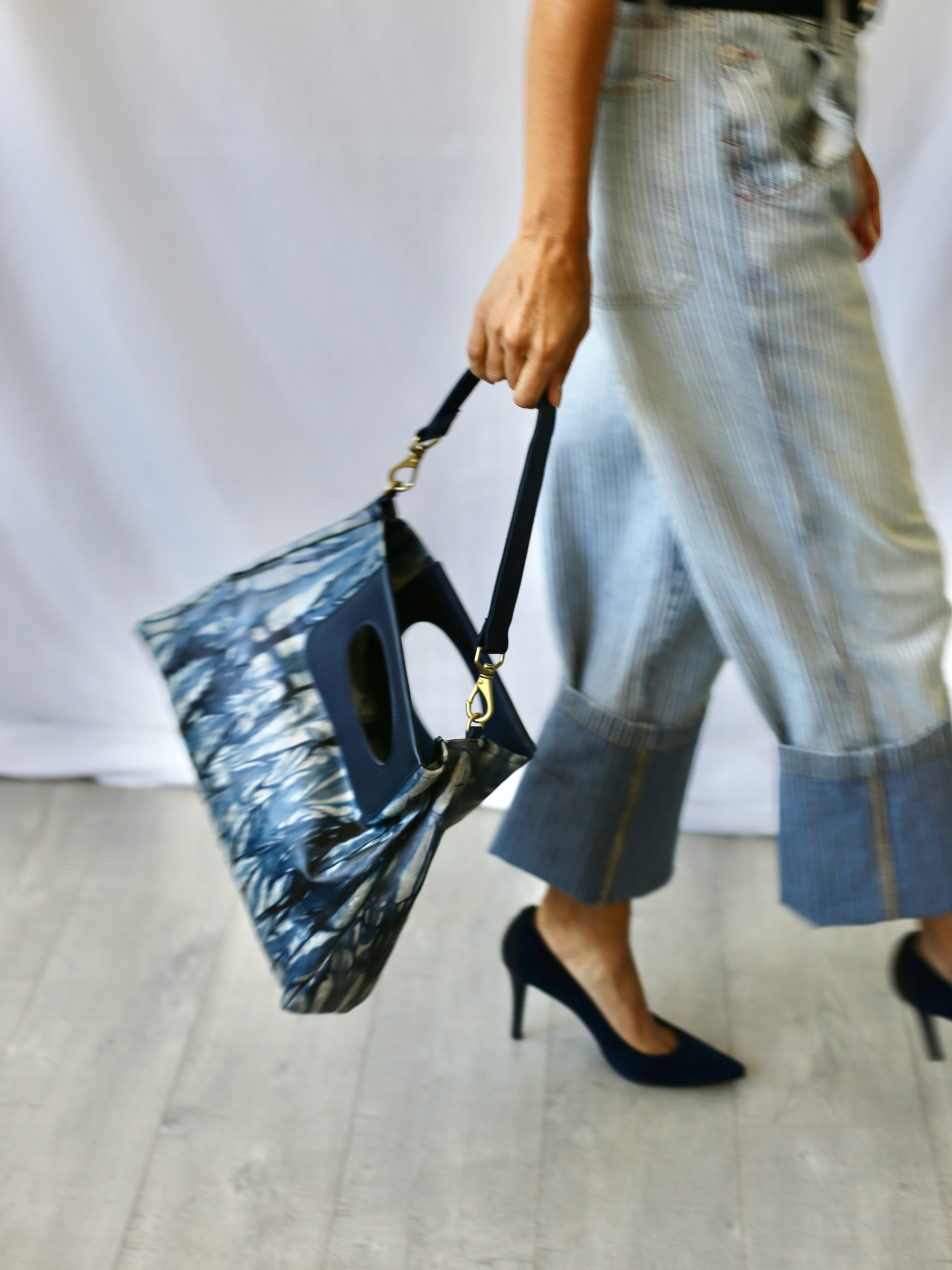 On the go.

The Cassie in Truckee River Tie Dye&mdash;one-of-a-kind and made to move with you.

Grab the Signature Cass handle, go hands-free with the crossbody strap, tuck it under your arm as a clutch, or add a shoulder strap. One bag, your way.
