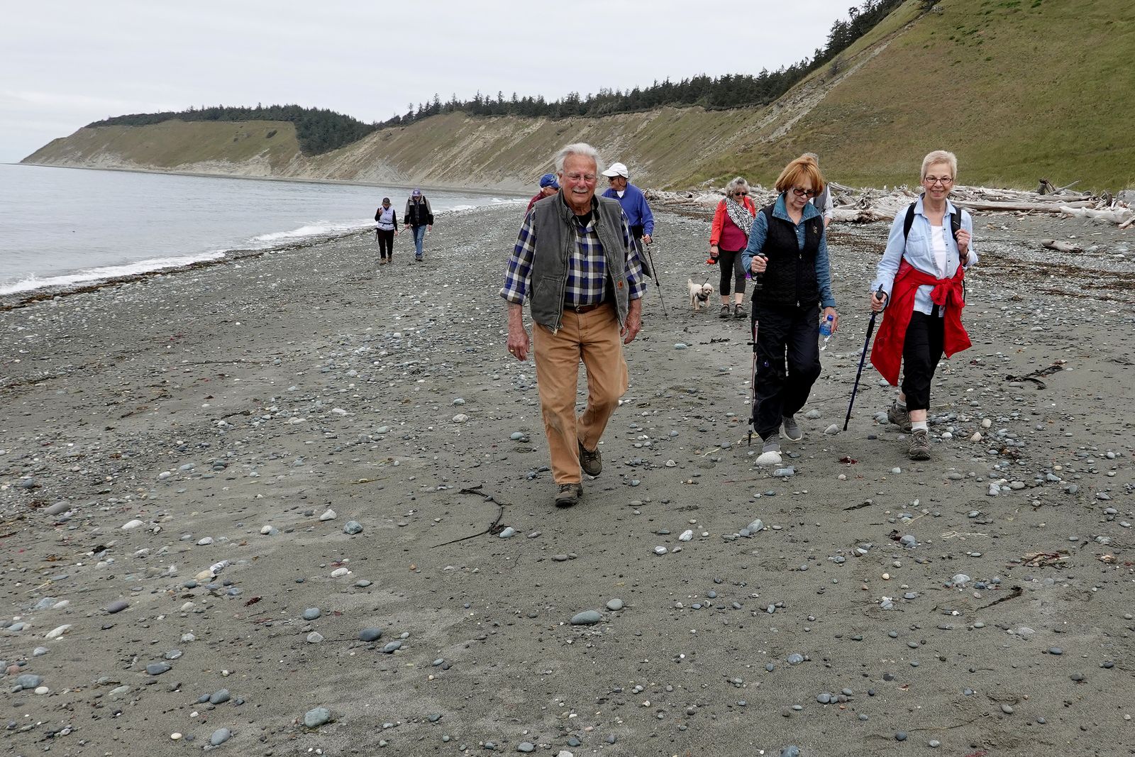 Jack, Judi and Sue walking on the beach
