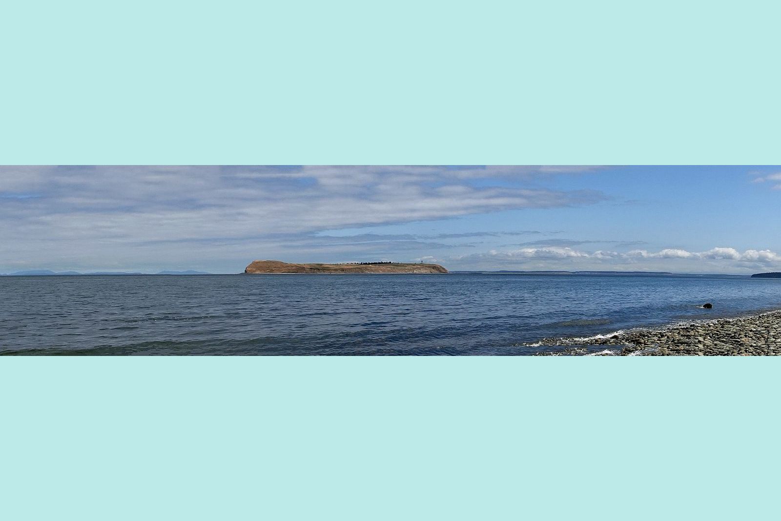 Protection Island with San Juan Islands background left