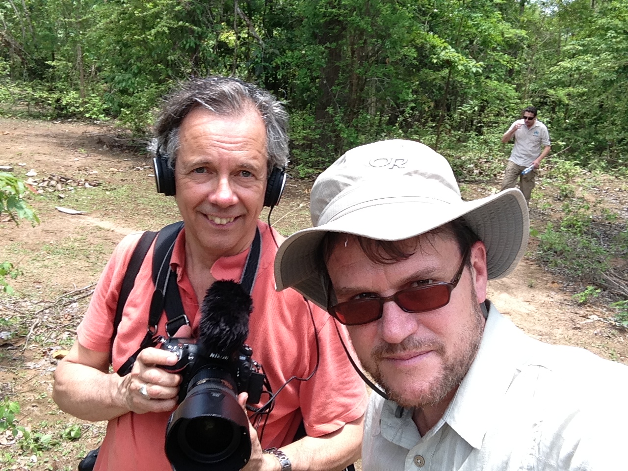 Canadian Press photographer Paul Chiasson and Mike Blanchfield coming out of the jungle in southern Laos after accompanying deminers. Photo: Mike Blanchfield.