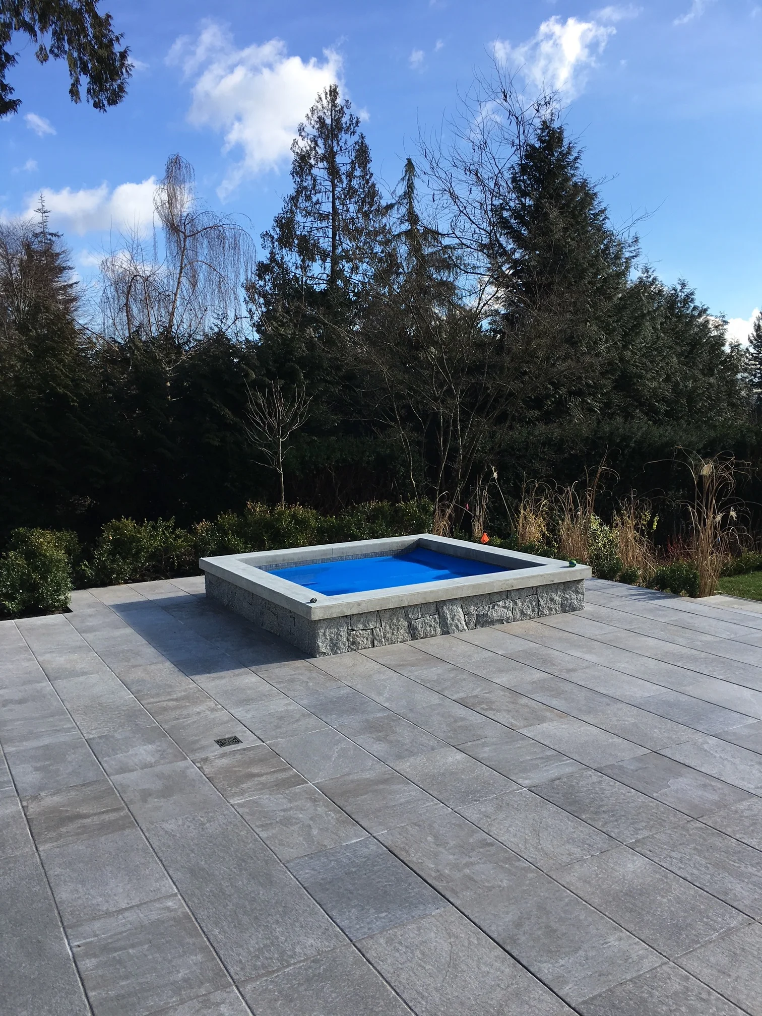 Granite hottub surround for outdoor pool area