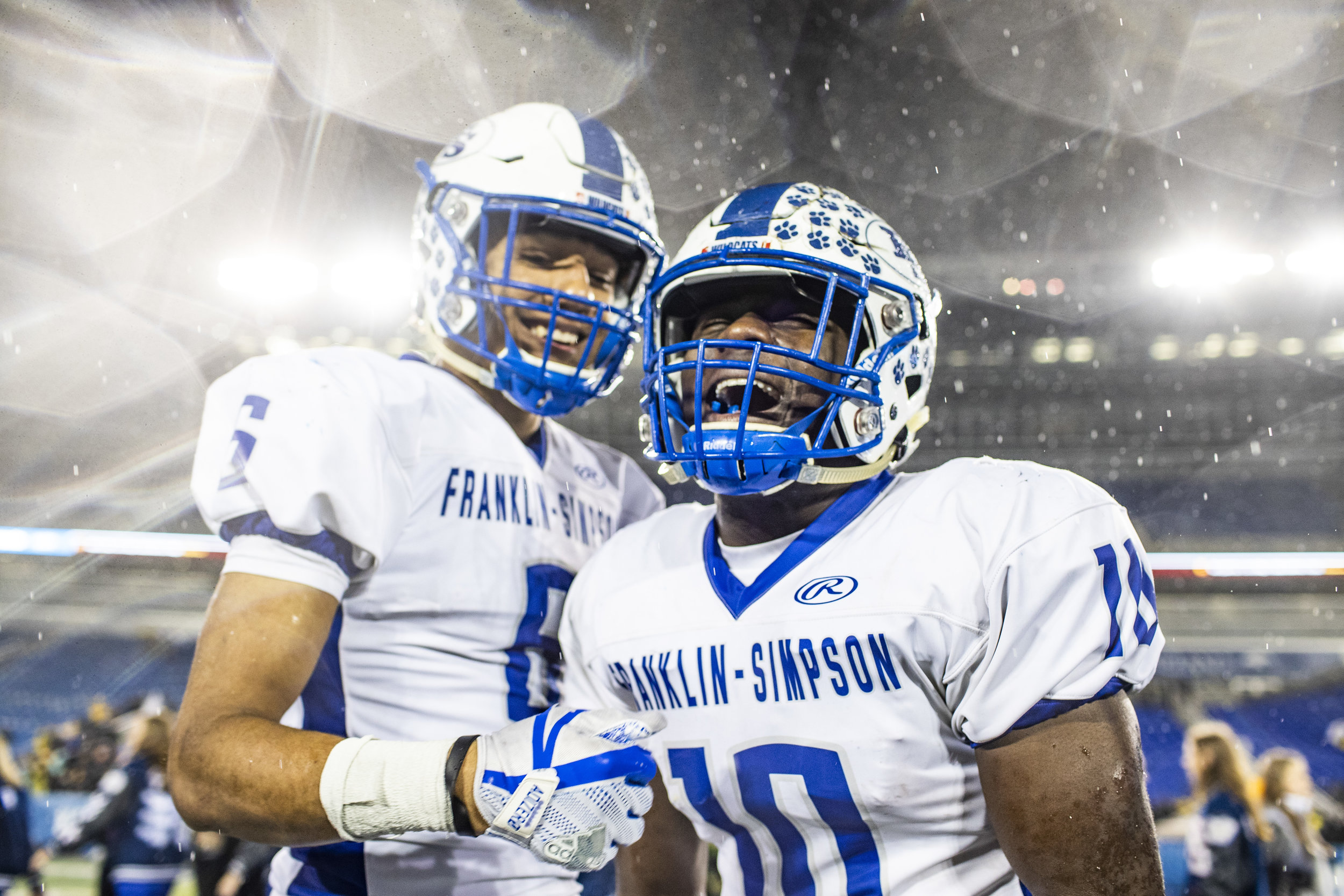 Franklin-Simpson's Leandre Stutzman, left, and Tre Bass celebrate after Franklin-Simpson's 14-12 win over Johnson Central in the Class 4A State Championship on Saturday, December 1, 2018, at Kroger Field in Lexington, Ky.