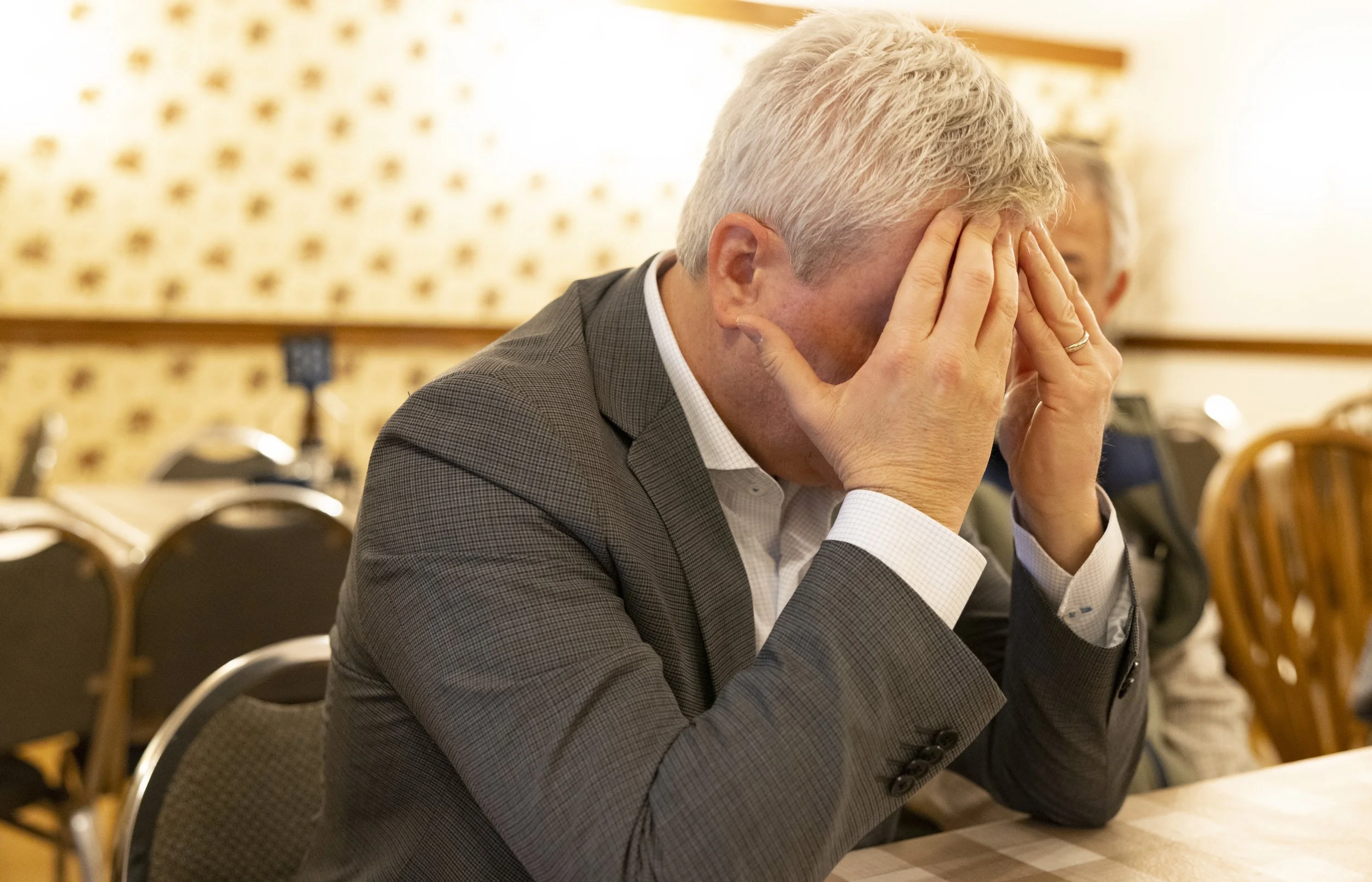  Representative James R. Comer, Republican of Kentucky, briefly rests his head in his hands during his second full day of back to back meetings at lunch on Thursday, Feb. 16, 2023, in Liberty, Ky. (Austin Anthony for the New York Times) 