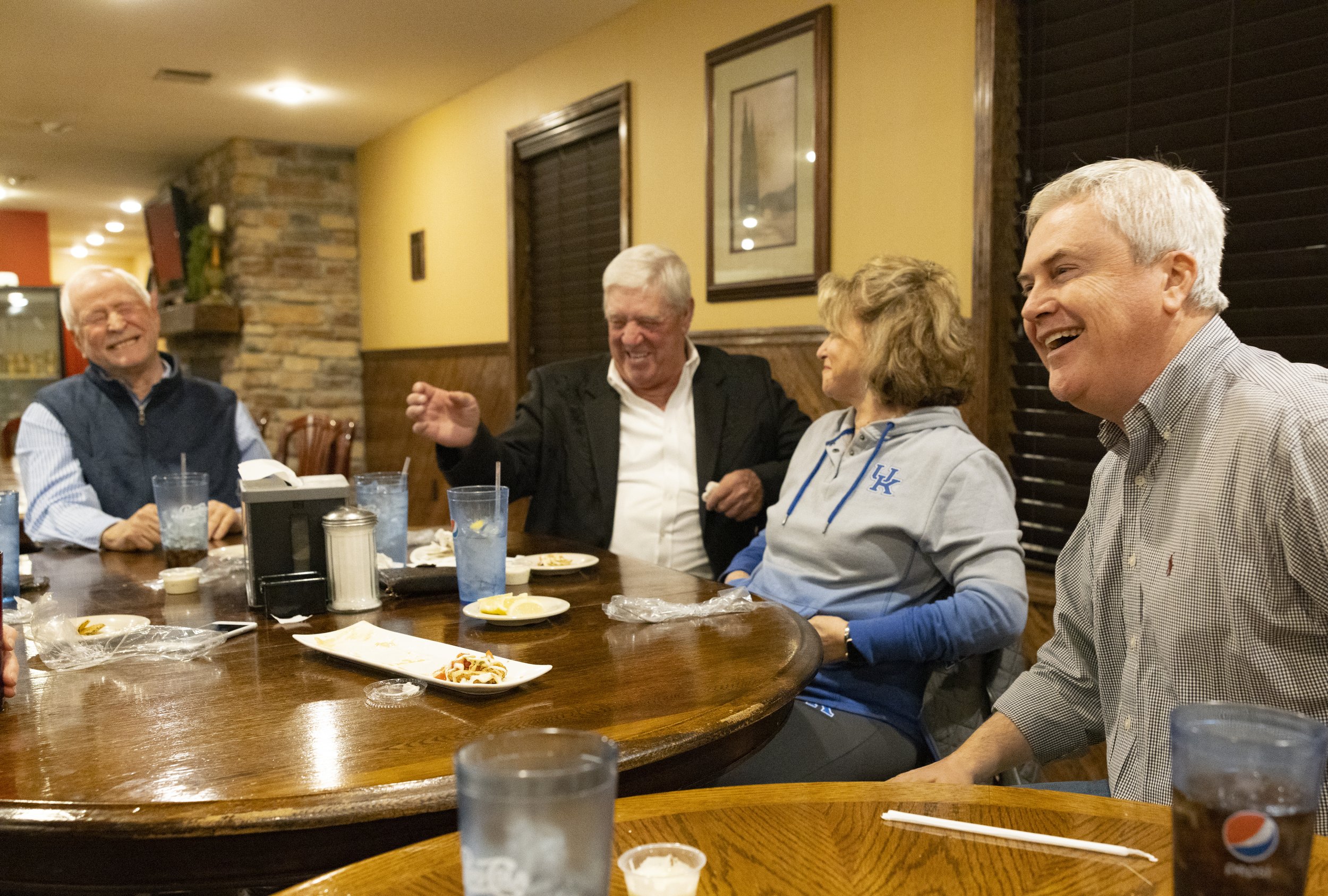  Representative James R. Comer, Republican of Kentucky, laughs while at dinner with his former political mentors Mitchell Paige, left, and Larry Pitcock, and Pitcock’s wife Helena, at Bob’s House Restaurant in Tompkinsville, Ky. (Austin Anthony for t