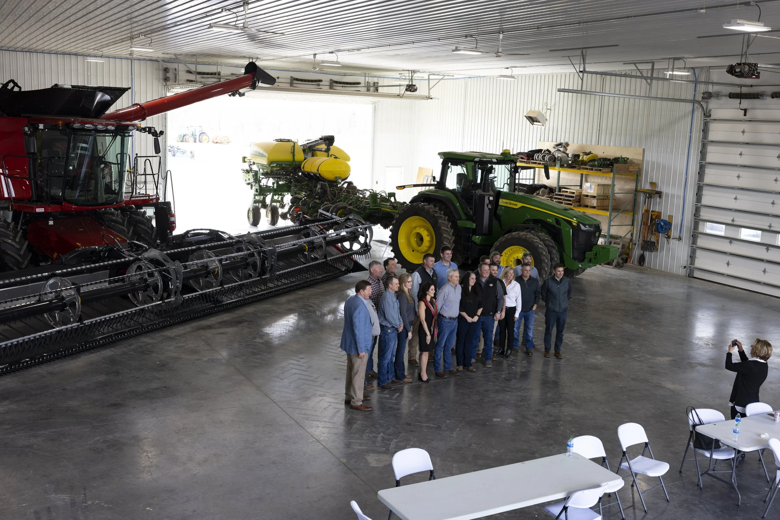  Representative James R. Comer, Republican of Kentucky, poses for a photo with constituents in front of a brand new combine on Wednesday, Feb. 15, 2023, at Sisk Farms in Hopkinsville, Ky. (Austin Anthony for the New York Times) 