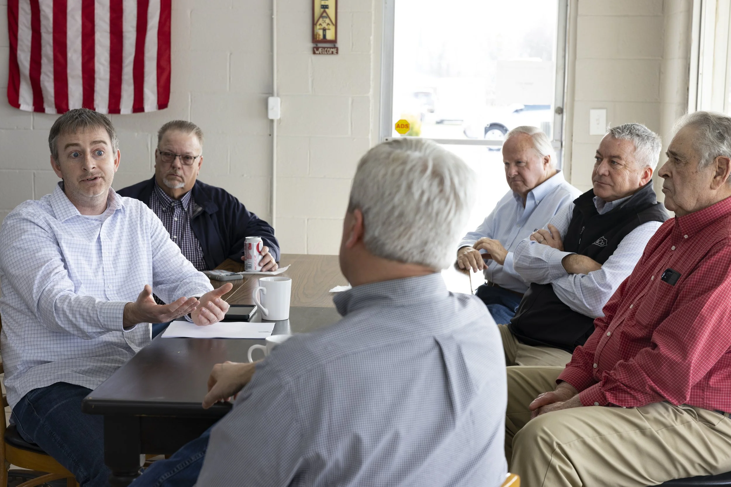  Representative James R. Comer, Republican of Kentucky, listens to local pharmacist Lance Mansfield as he complains about legislative impediments to his business on Wednesday, Feb. 15, 2023, in Elkton, Ky. (Austin Anthony for the New York Times) 