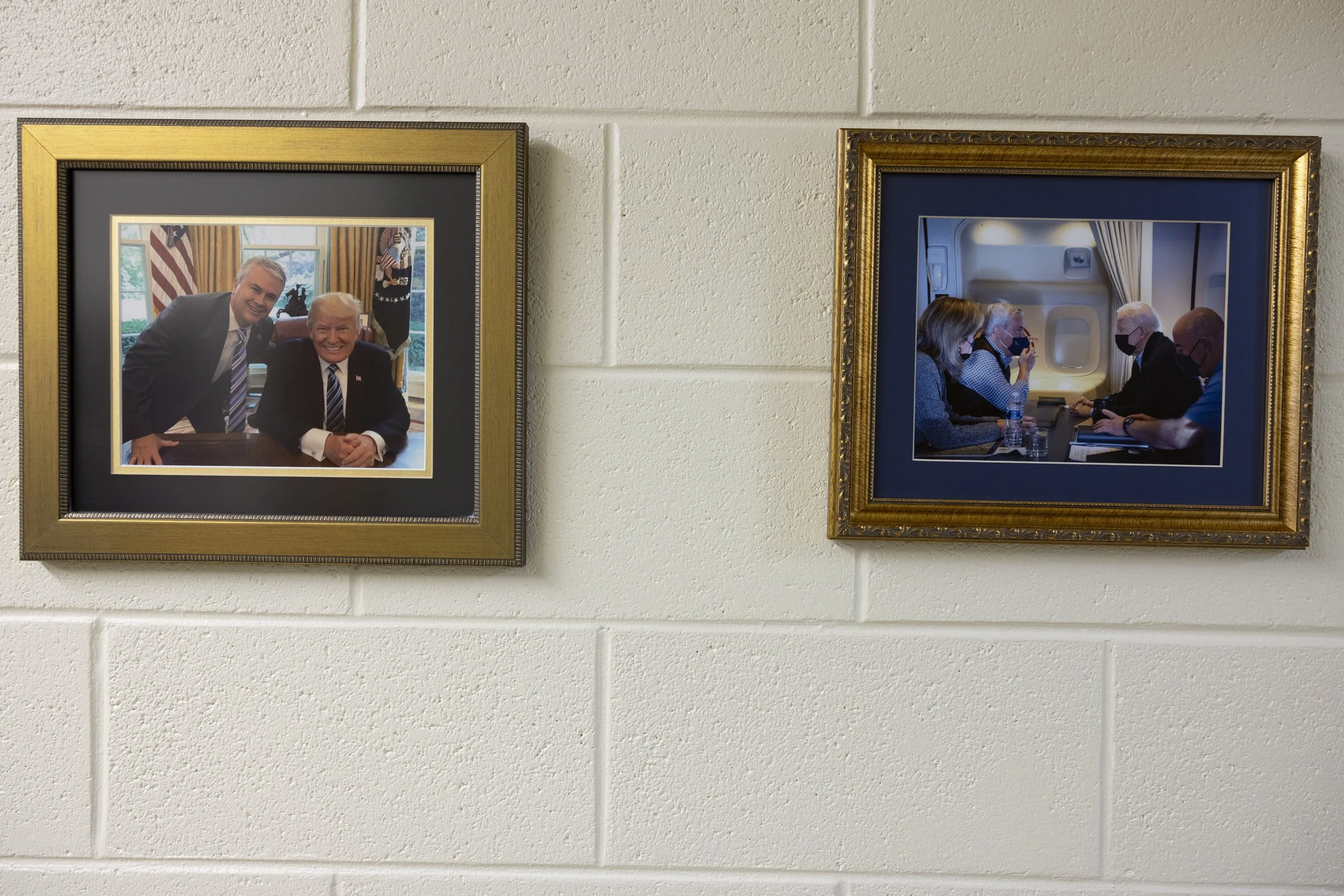  Framed photos of Representative James R. Comer, Republican of Kentucky, with former President Donald Trump and current President Joe Biden in his office in Tompkinsville on Thursday, Feb. 16, 2023. (Austin Anthony for the New York Times) 