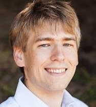 Travis May