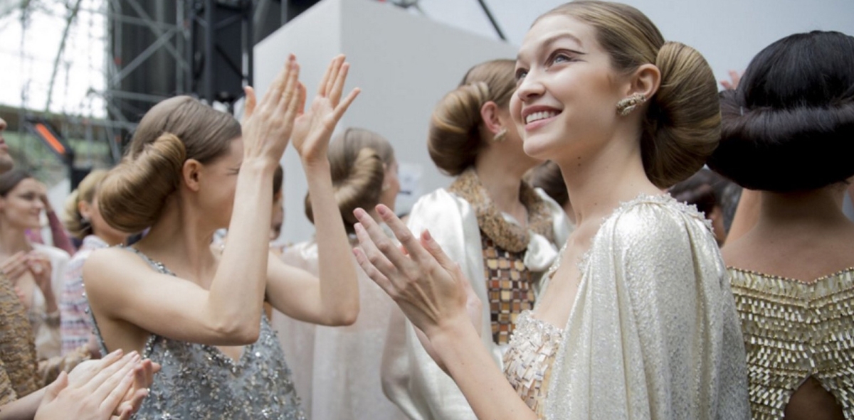 Gigi Hadid backstage at Chanel Haute Couture S/S 16. Photograph by Kevin Tachman, source: Vogue