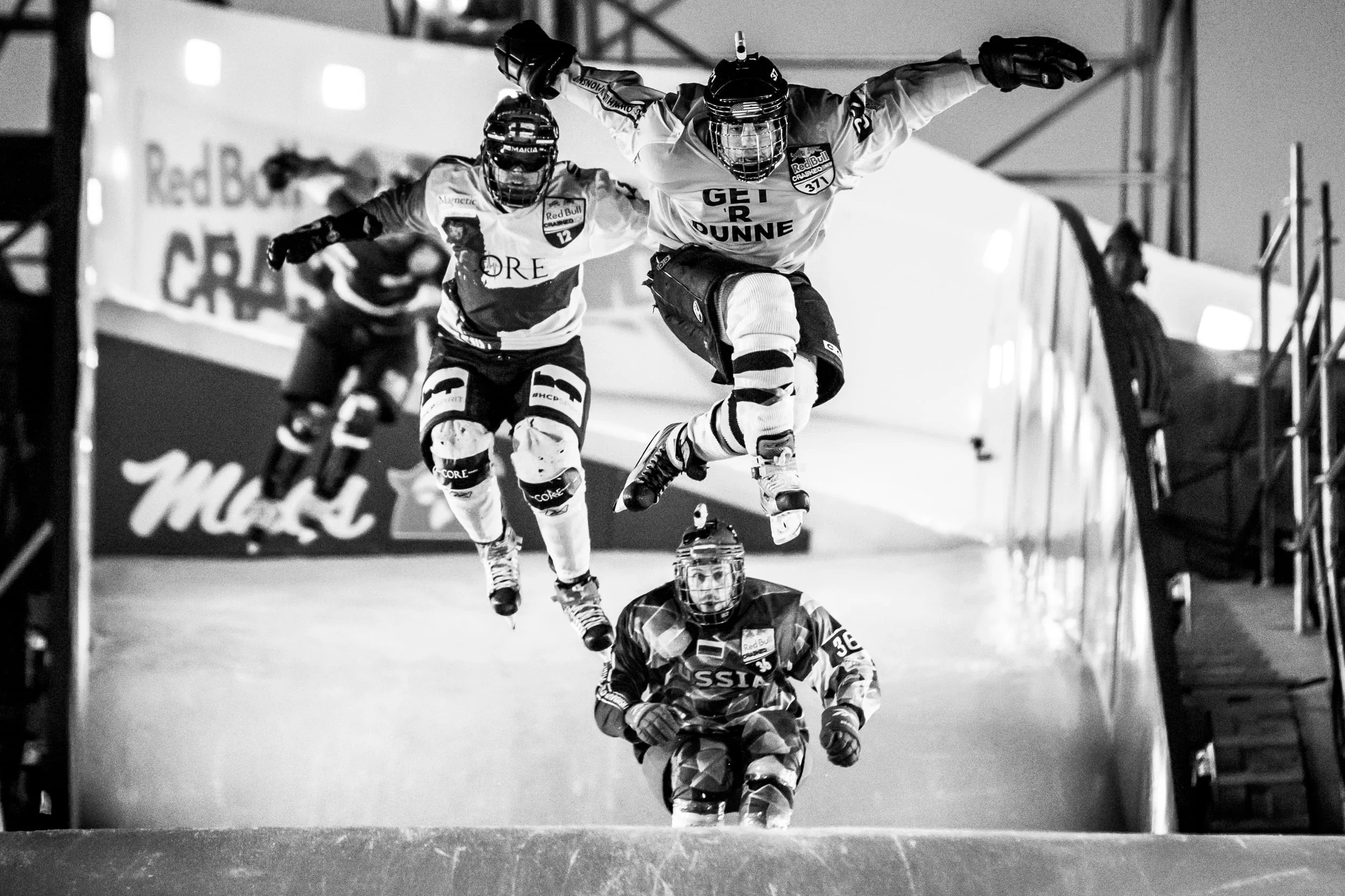 Pavel Kryukov of Russia, Max Dunne of the United States, Adam Horst of Canada and Lukas Kolc of the Czech Republic compete during the fourth stage of Red Bull Crashed Ice, the Ice Cross Downhill World Championship in Edmonton, Canada on March 14, 2015