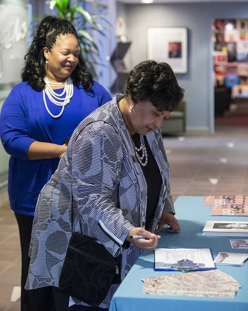 Reena Evers, daughter of civil rights icons Mrs. Myrlie Evers-Williams and Medgar Evers, arrives at Smithsonian Anacostia Community Museum. Mrs. Myrlie Evers-Williams is a Delta Jewel. (Photo courtesy of Smithsonian Institution)
