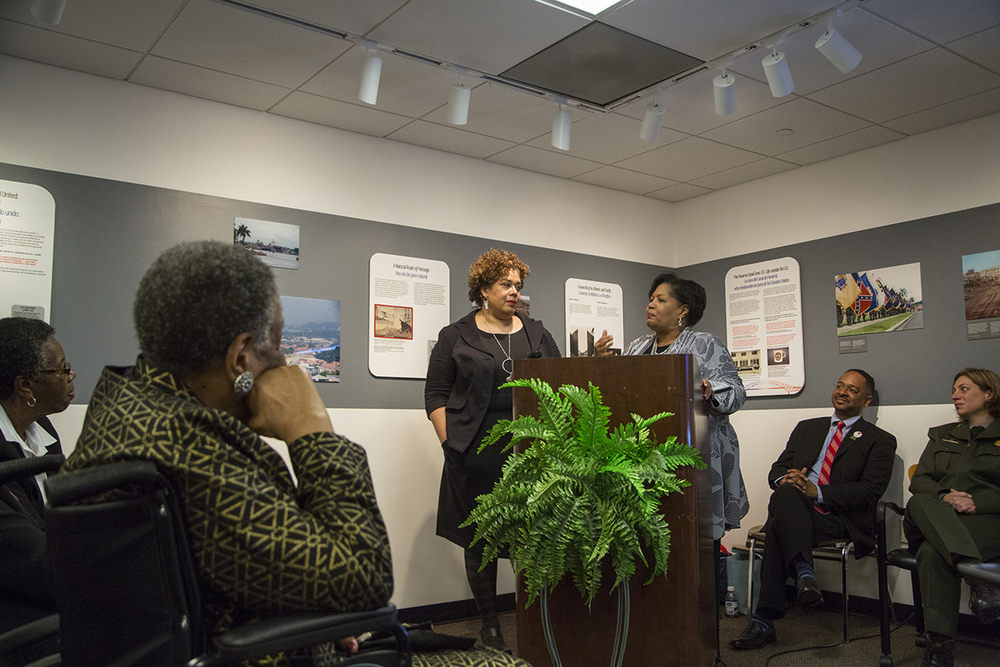  Reena Evers (right) speaks on behalf of her mother, Delta Jewel Myrlie Evers-Williams, commending Alysia Burton Steele for gathering and preserving untold stories of Mississippi Delta church mothers. (Photo courtesy of Smithsonian Institution) 