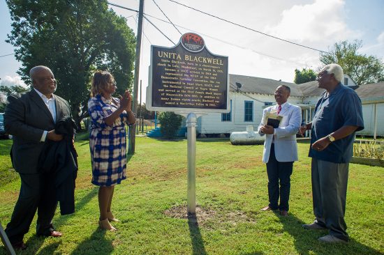 Congressman Bennie Thompson (left to right), Mayersville mayor Linda Short, Dr. Rolando Herts, director of the Delta Center for Culture and Learning, and Dr. Leslie McLemore, chair of the Mississippi Freedom Trail Task Force, stand in front of the newly unveiled Unita Blackwell marker.