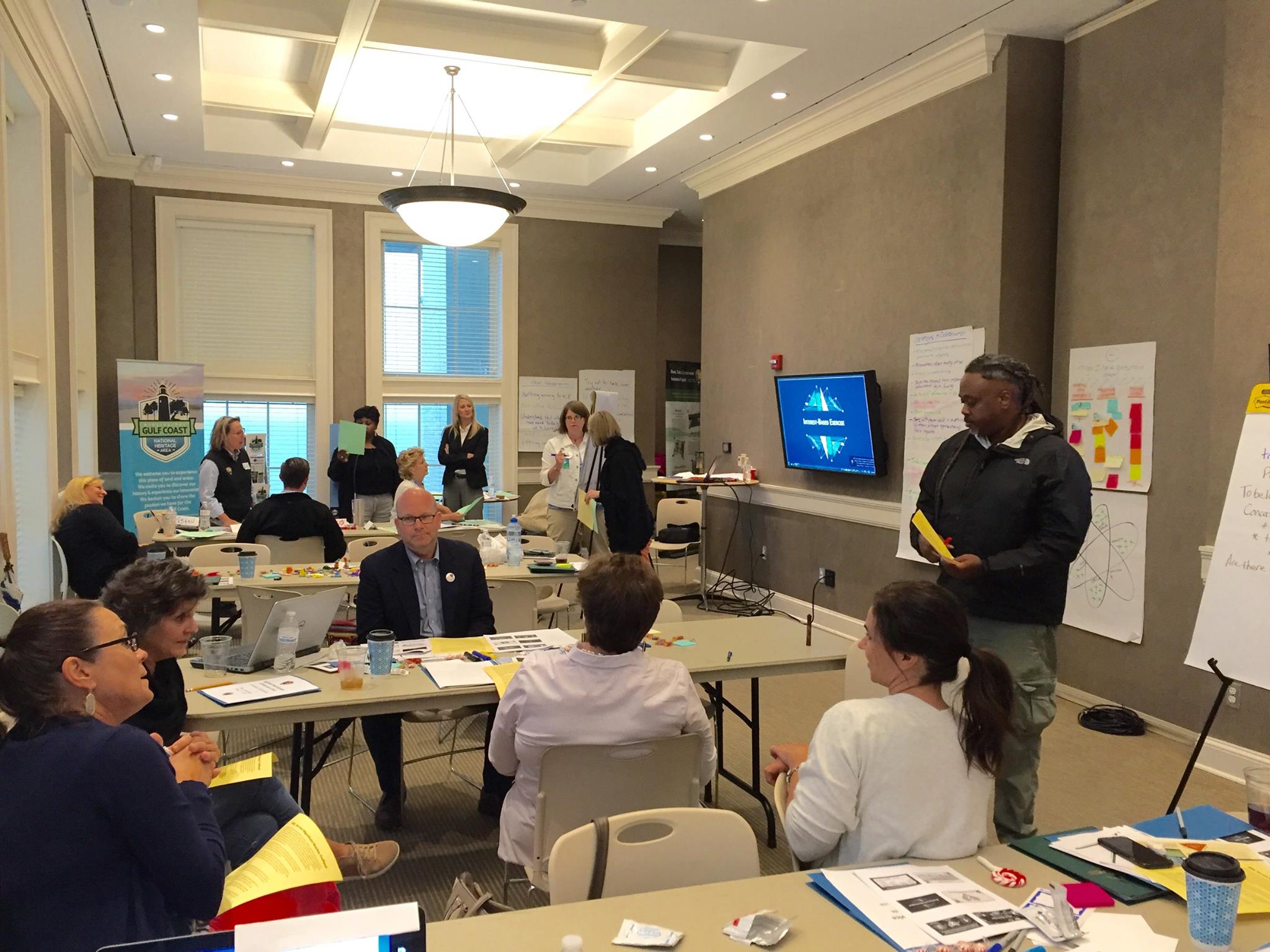 Collaboration Clinic participants from Mississippi and across the country engage in a team visioning exercise at the Biloxi Visitors Center.