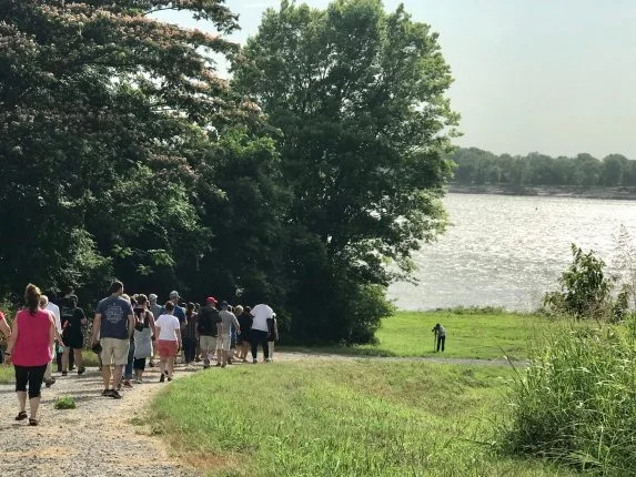 NEH Most Southern Institute participants walk to the Mississippi River at the historic Flood of 1927 levee break site.