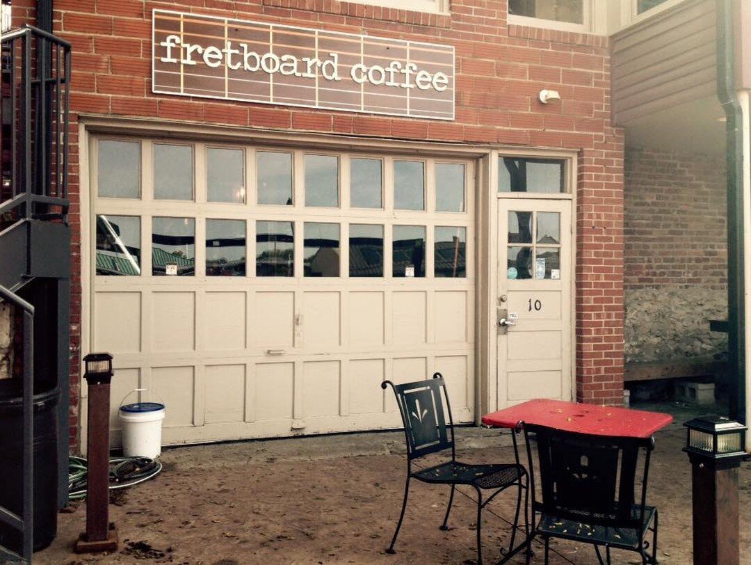 Here&rsquo;s a #throwbackthursday to our garage door entrance from when Fretboard was a wee infant! 

Gosh. Kids grow up so fast. 🥲
&bull;
&bull;
#fretboardcoffee #thedistrictcomo #caffeinatecomo #shoplocal #coffeeshop #columbiamo