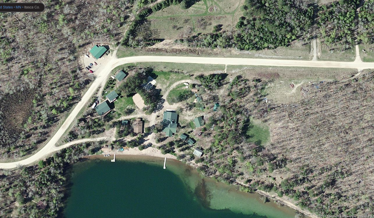 An aerial site plan of the overall camp property. The Welcome Center will be located on the Southwest portion of the site plan near the water's edge.