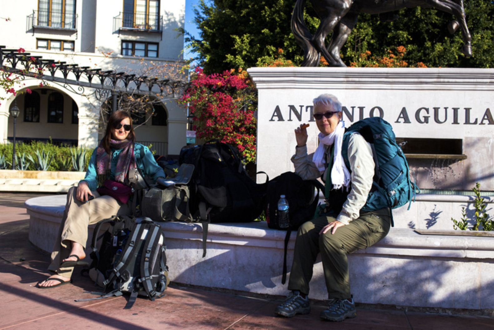 Relaxing after a long walk with heavy bags