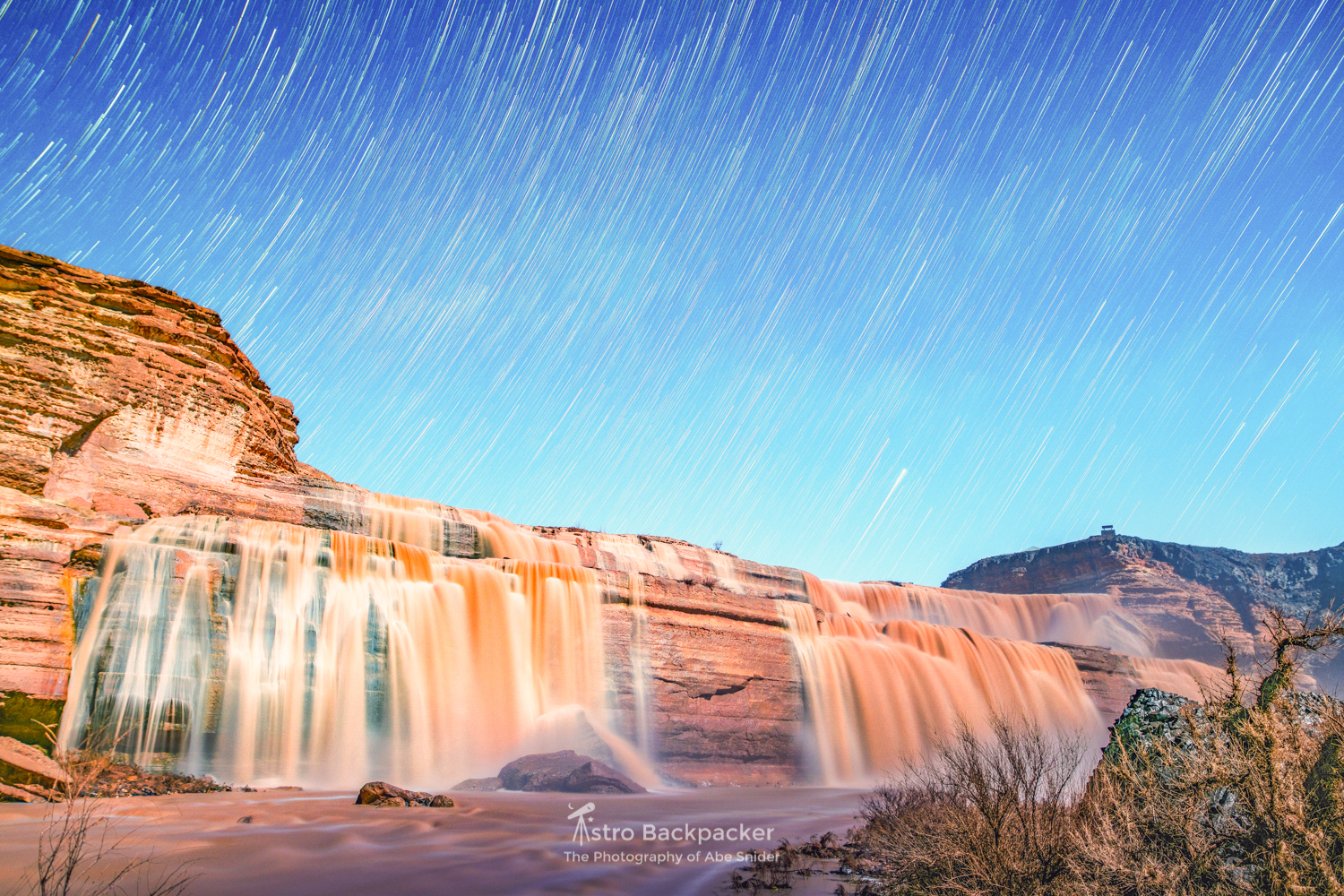 Grand Falls under a setting moon.