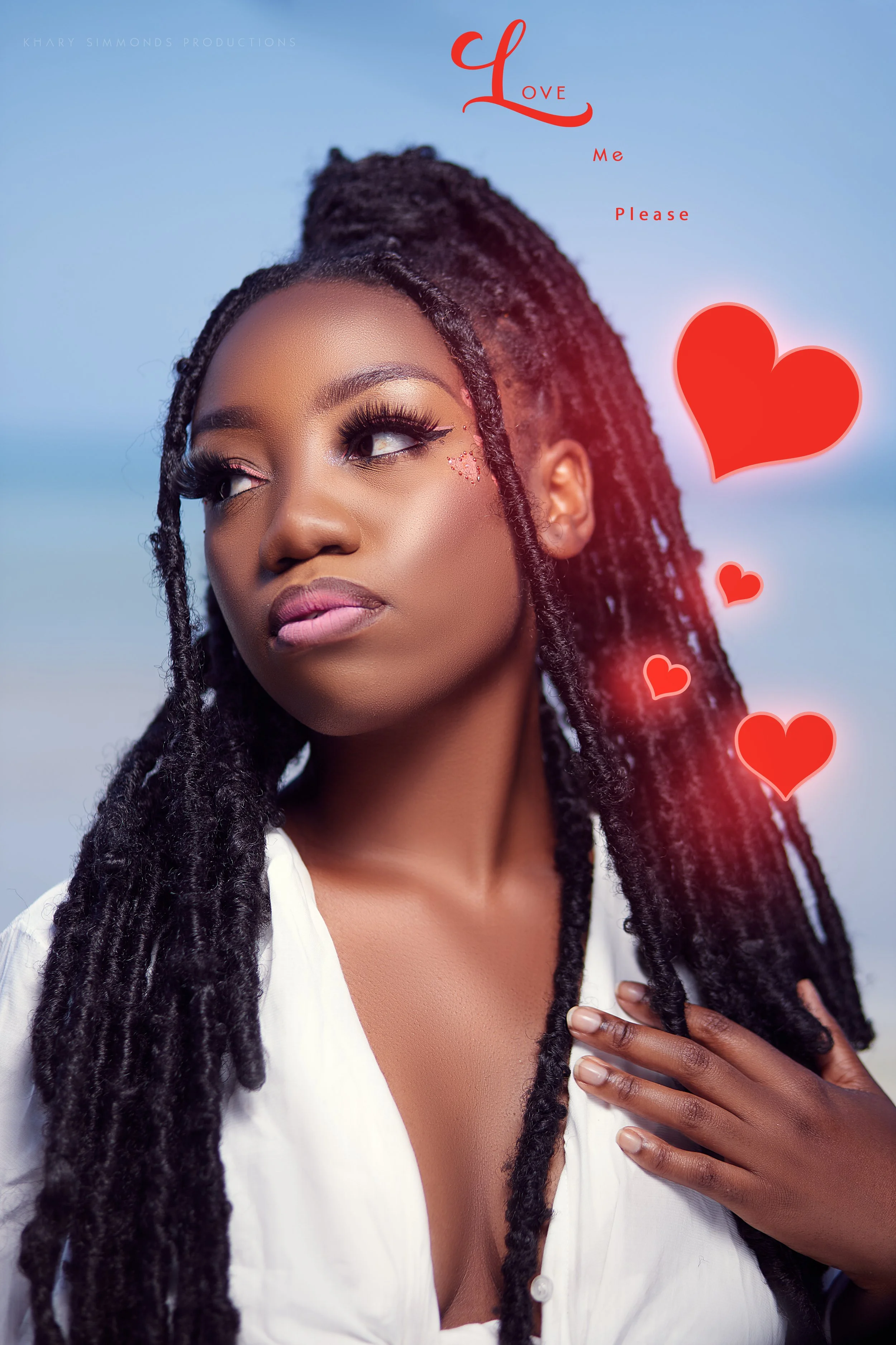 A woman with long dreadlocks and makeup, looking away with a thoughtful expression, with red hearts and text saying 'Love Me Please' in the background.