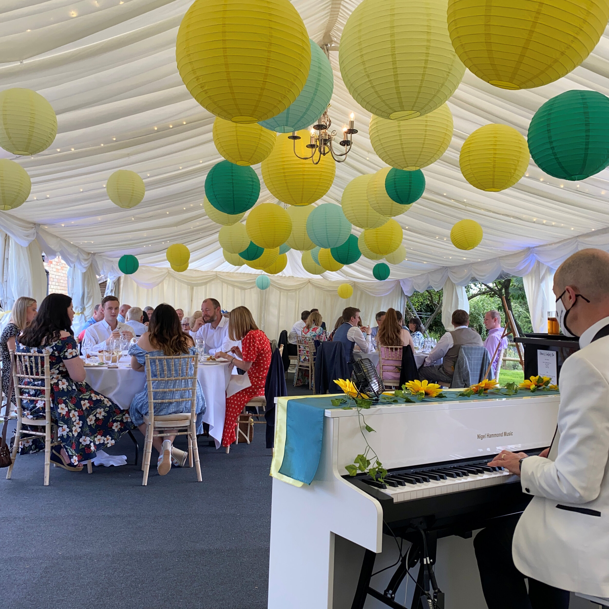 Performing on second mobile piano in marquee for Caroline and Adrian's wedding reception