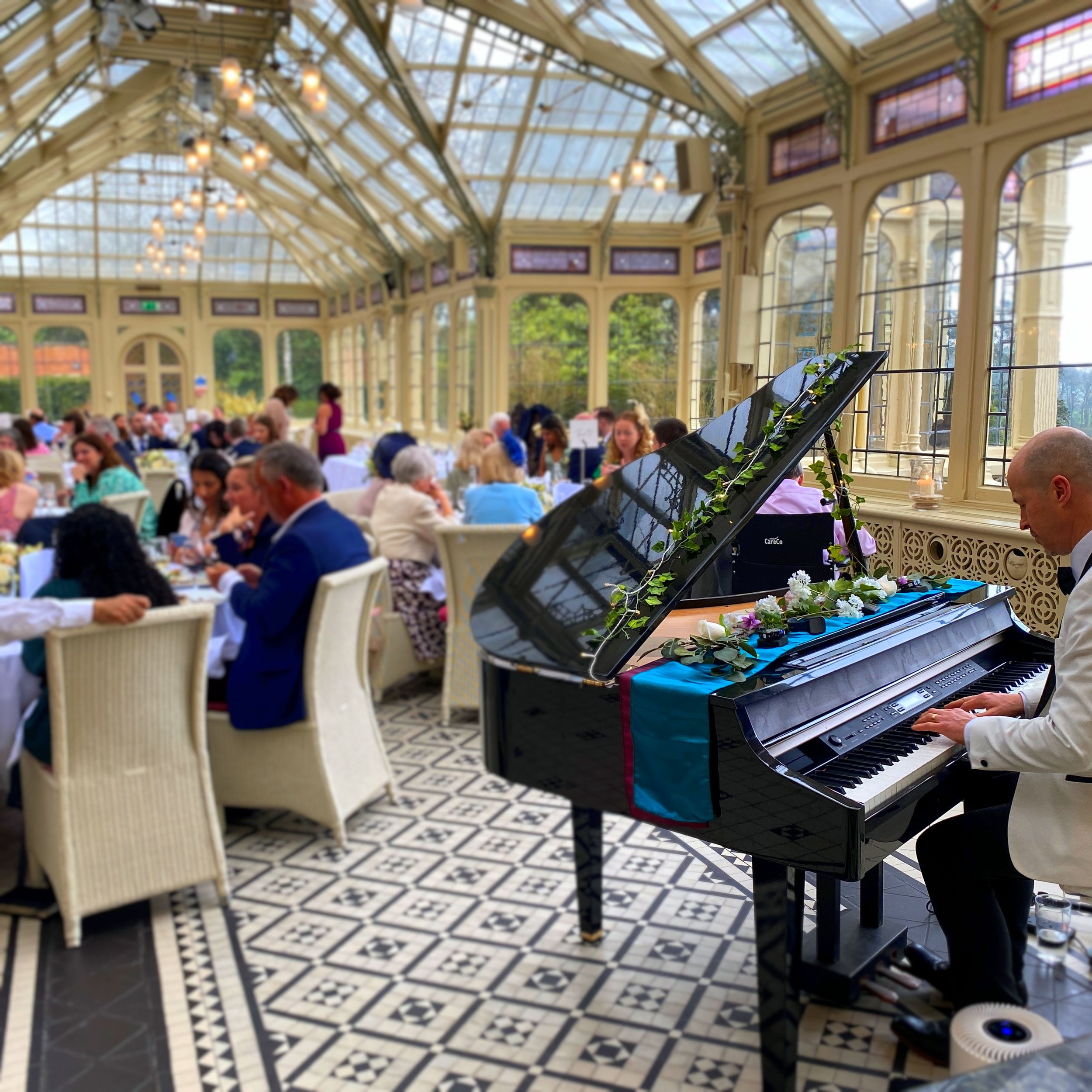 Performing on the baby grand at Kilworth House