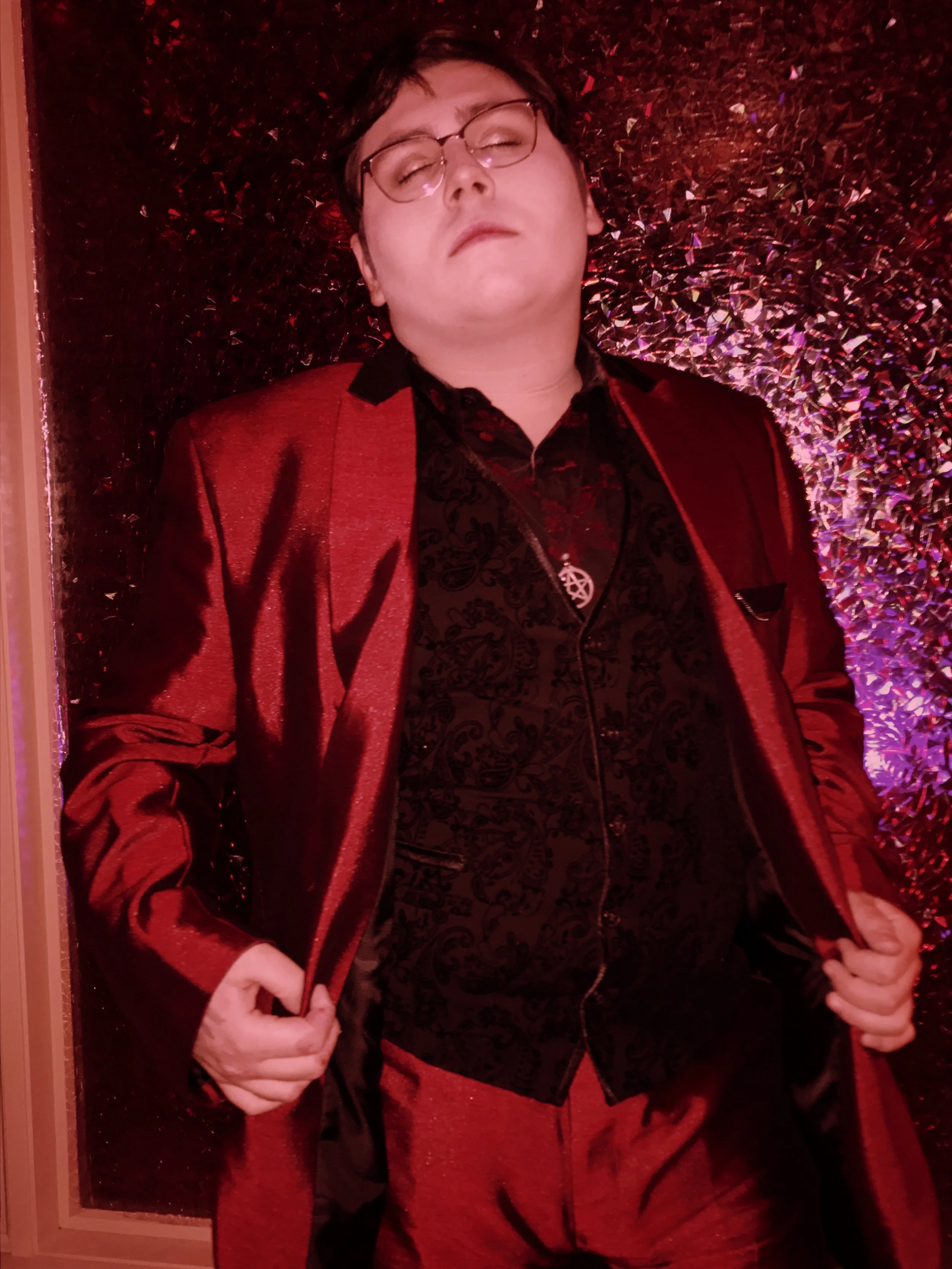 Dracula feeling himself in his taffeta suit.