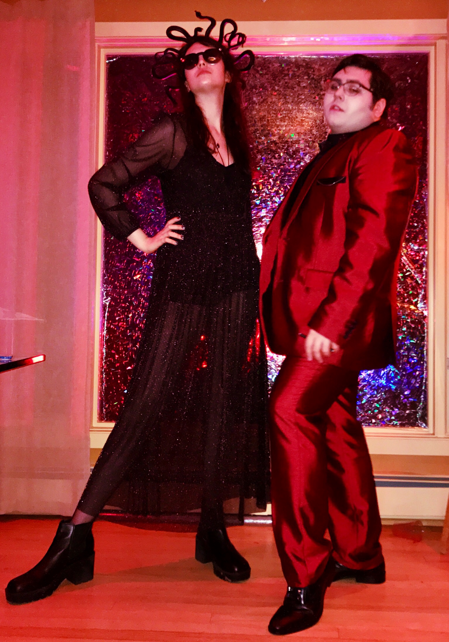 Dracula’s date, Medusa flaunting her long legs in a glimmering, sheer dress.