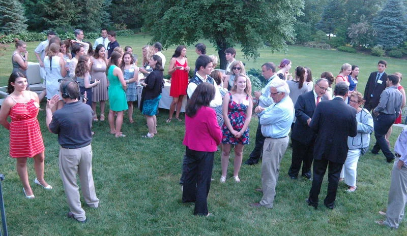 Newtown Scholarships Association board members, school district educators and administrators, and students mingled on the lawn at The Dana-Holcombe House prior to awards being presented during The Third Annual NSA Awards Reception June 11. 