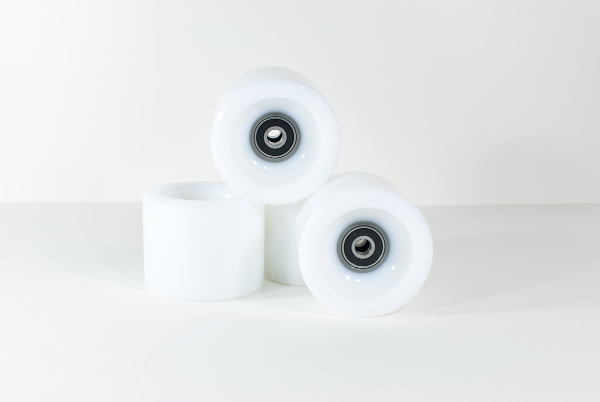 the-four-design-odd-velvet-skateboard-red-rocket-wheels-white.jpg