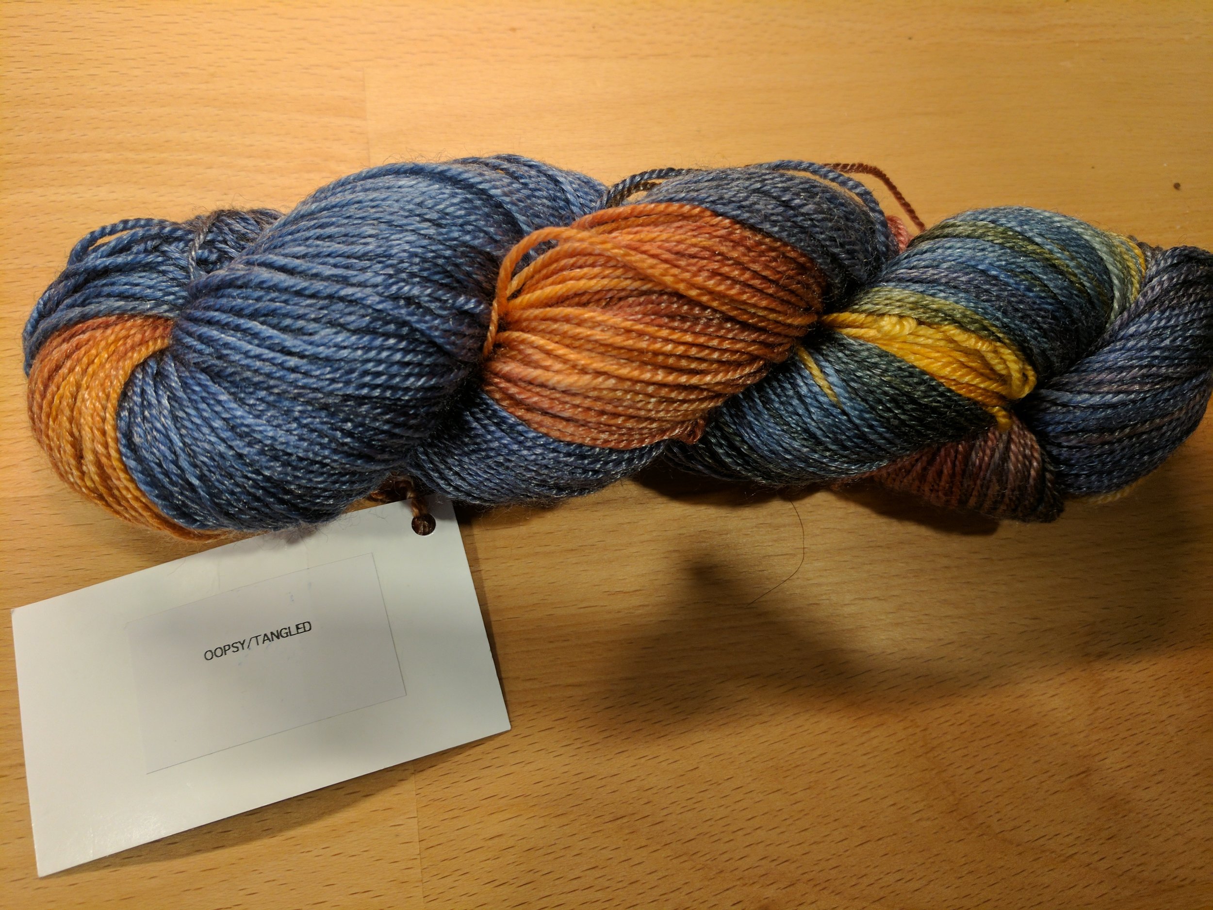 Maybe the not 100% smoothness of the skein got it thrown it the oopsie pile? Anyways, score by me! Half price, full value. 